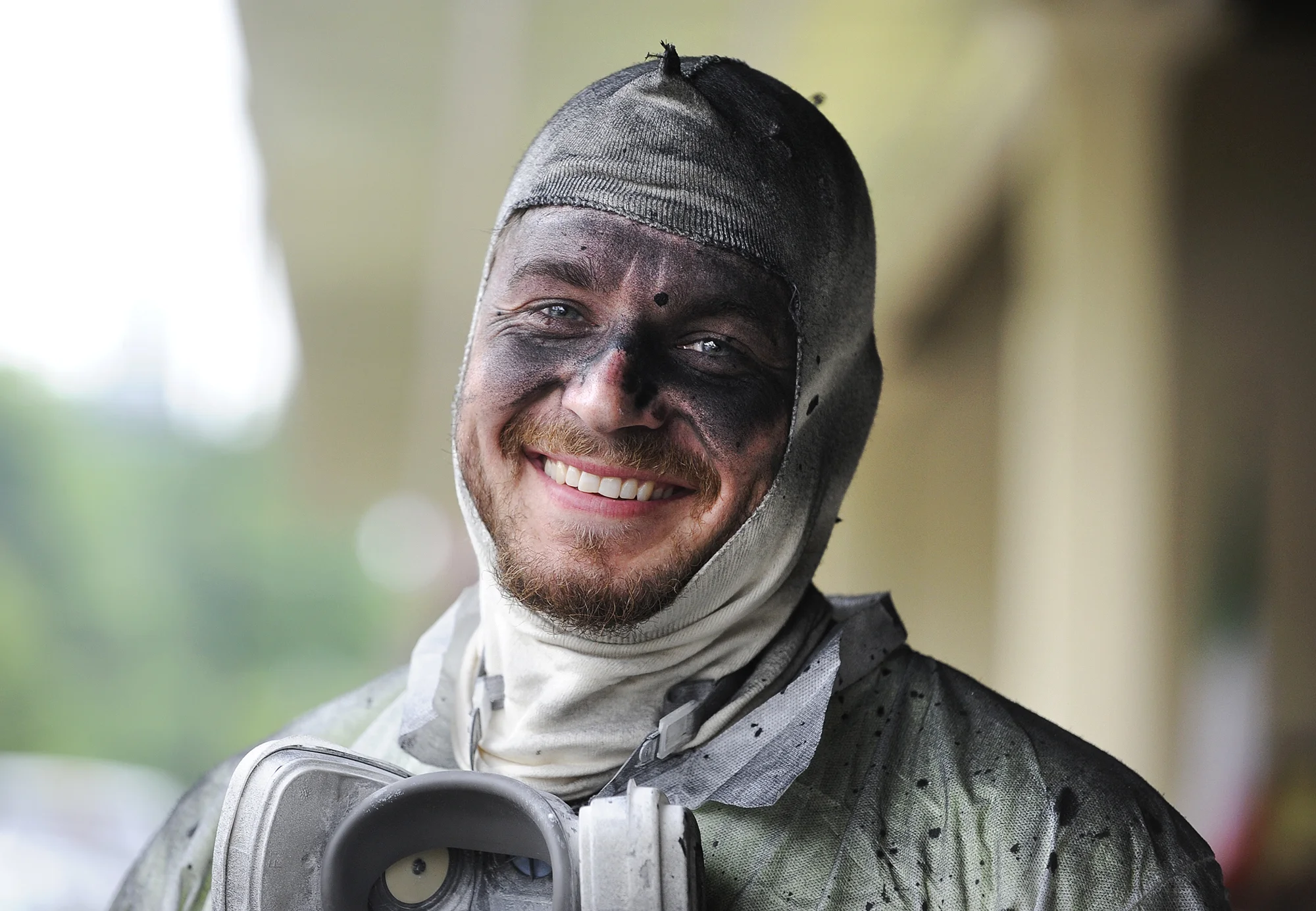  Matt Jackson smiles after removing his respirator during a break from painting the ceiling of the future new home of the Arts Council of Southeast Missouri on Tuesday, May 10, 2016. Jackson was blacking out the ceiling of a front room with drywall p
