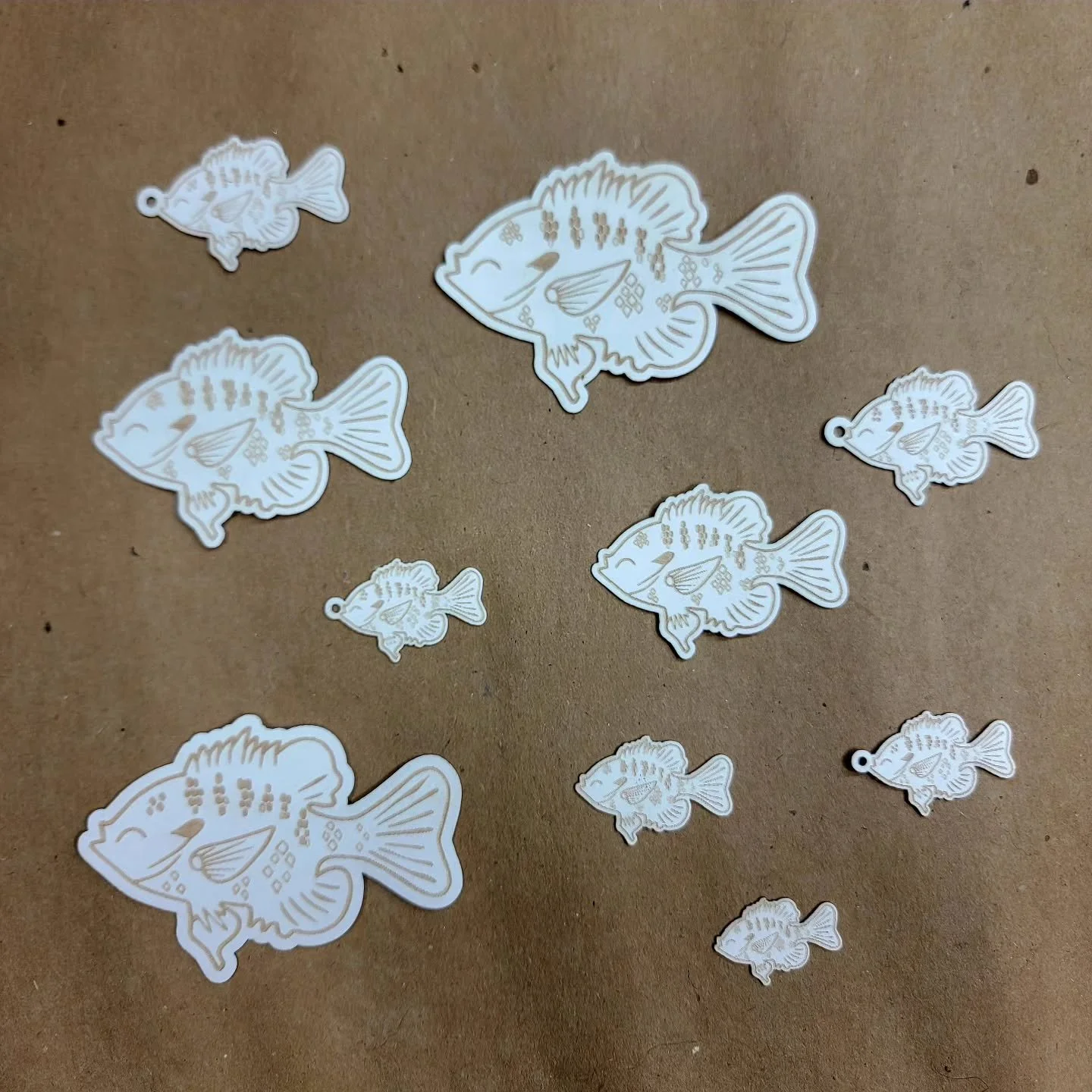 Paper fishes...

Different size test cuts for... magnets? Earrings? Keychain?

#BillytheBlugill #47thparallelart #designprocess