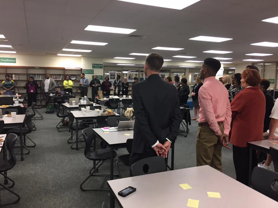Community Circle during a staff meeting.