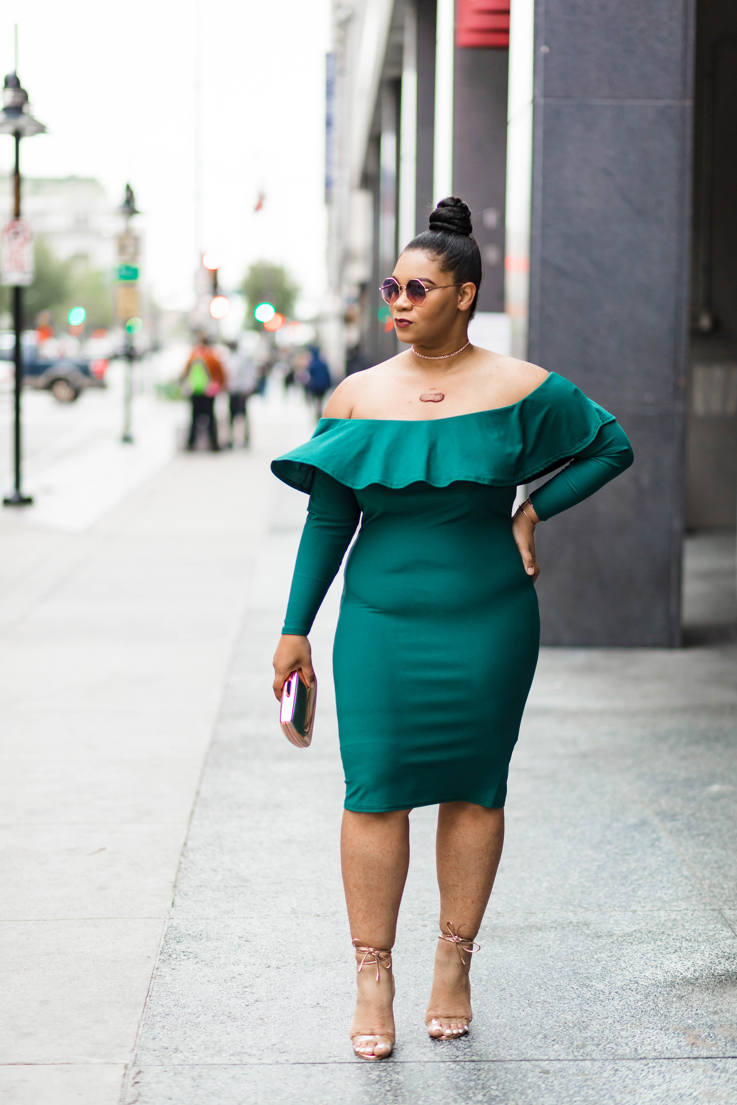 navy dress with rose gold accessories