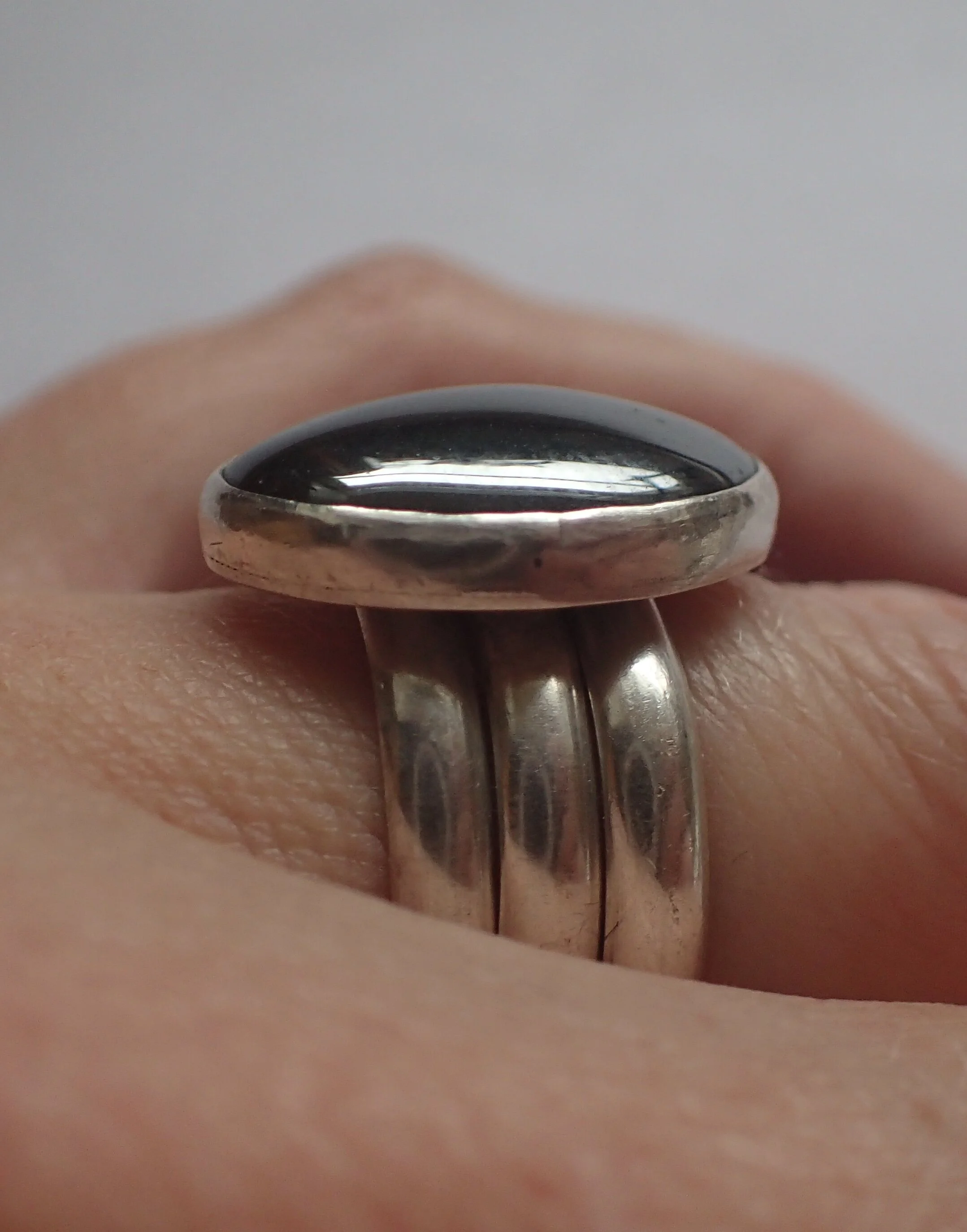 Hematite and Silver, stacking rings. Size 6.25