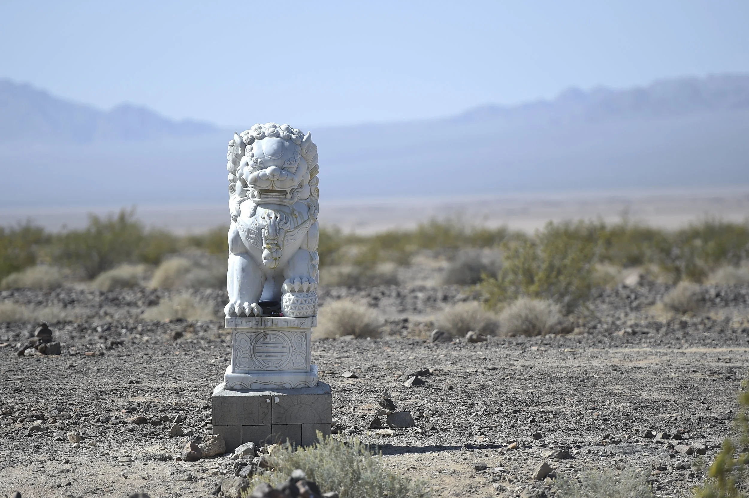 In the middle of nowhere, someone had left a notebook next to it. The notes explained when they thought it arrived but not sure why it's there. People left offerings, money, toys.