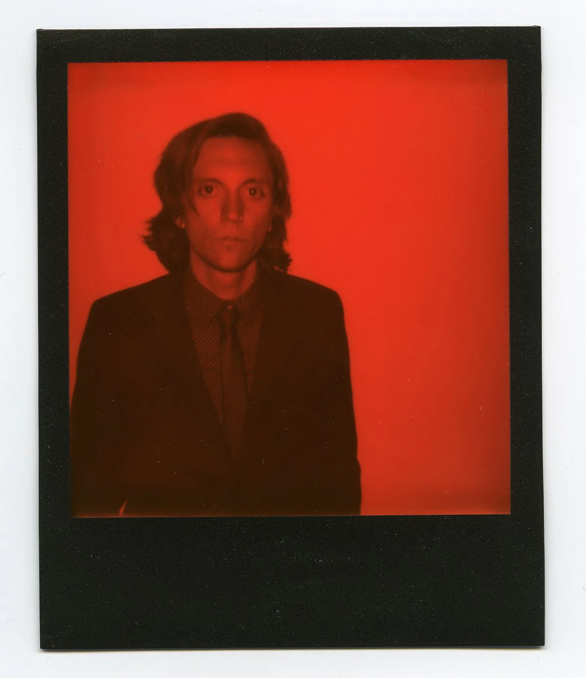 The tall cool one - Joe Skibinski - Shot on Polaroid 600 Camera with Impossible Black And Orange Duochrome Instant Film - Speedway, IN