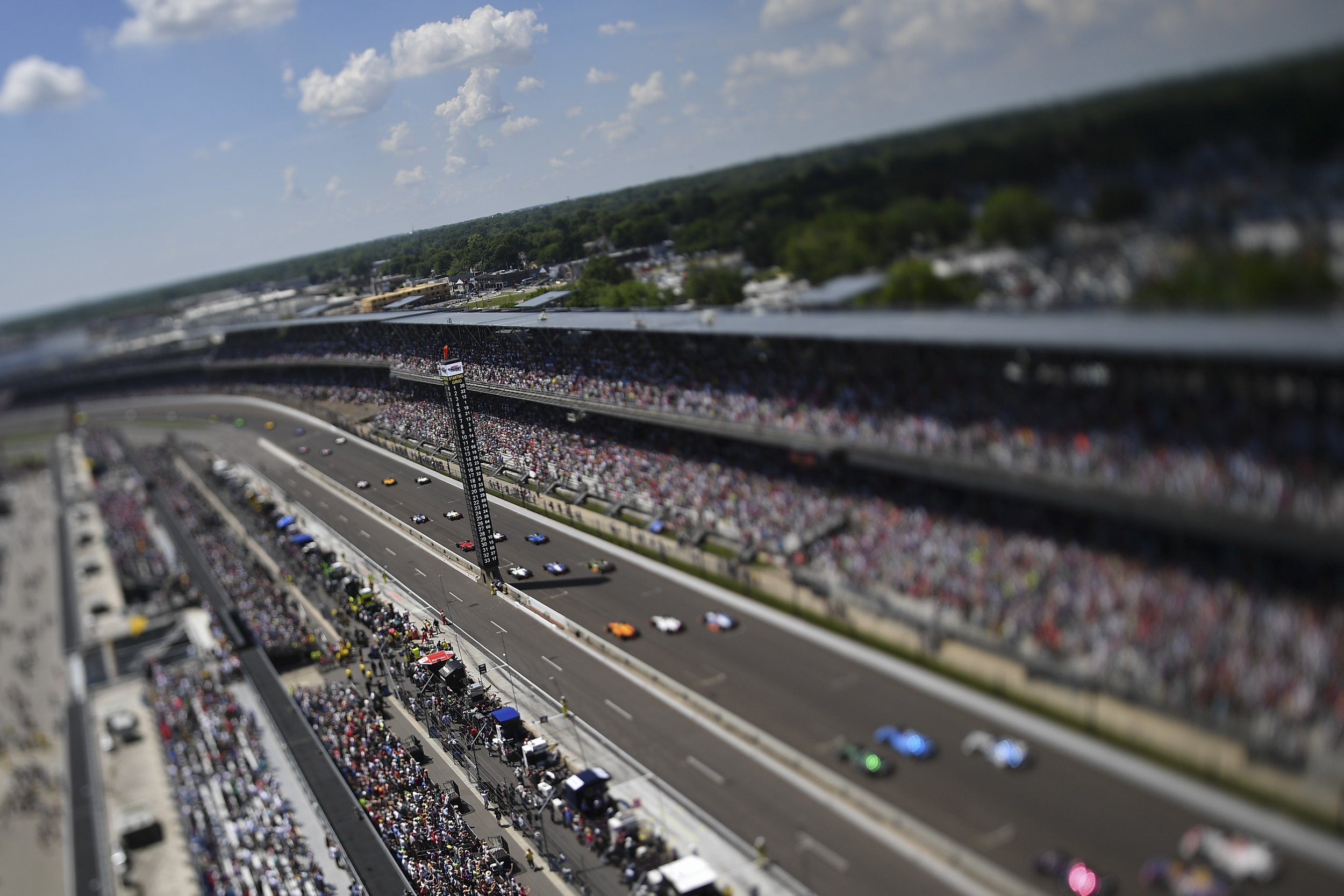  I wanted to do something different for the start of this year’s Indy 500. Our staff has all bases covered, inside and outside turn 1,2,3 and 4. Why not the roof? The tilt-shift specialty lens gives a creative almost toy look to the shot.     