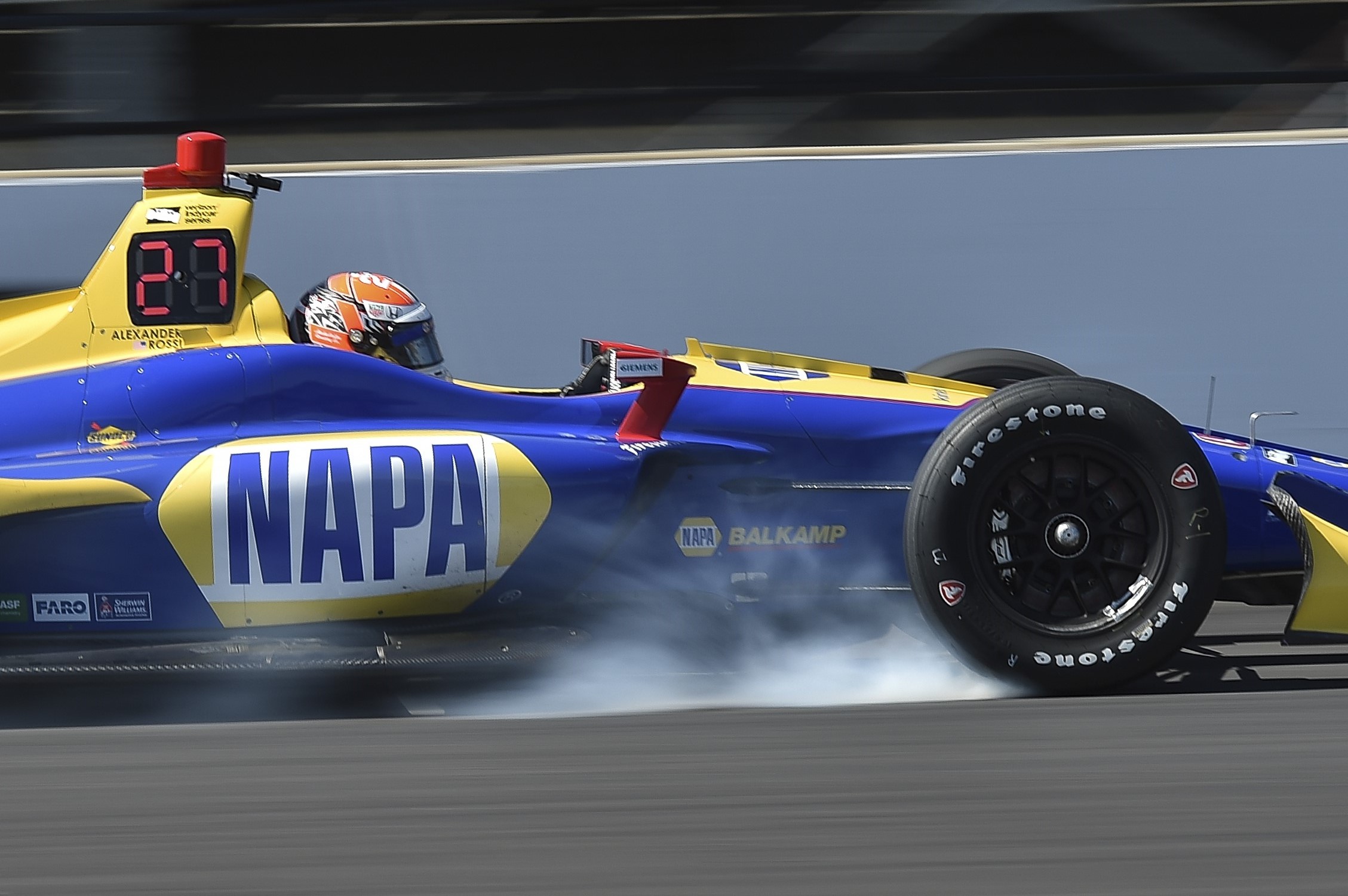  Coming in hot!&nbsp; Alexander Rossi locks up the breaks during the INDYCAR GRAND PRIX     