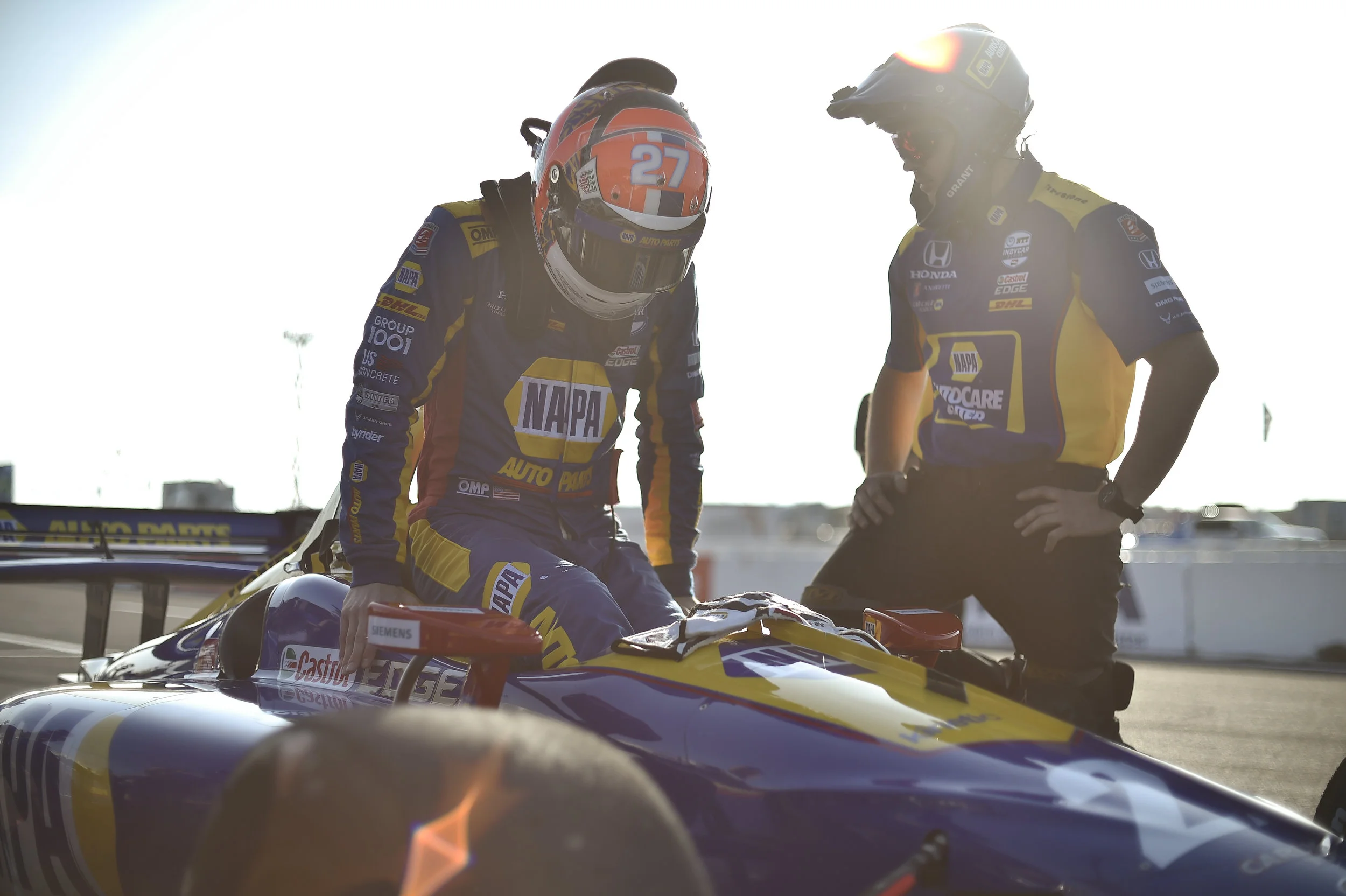 Alexander Rossi loads in his IndyCar before morning practice.