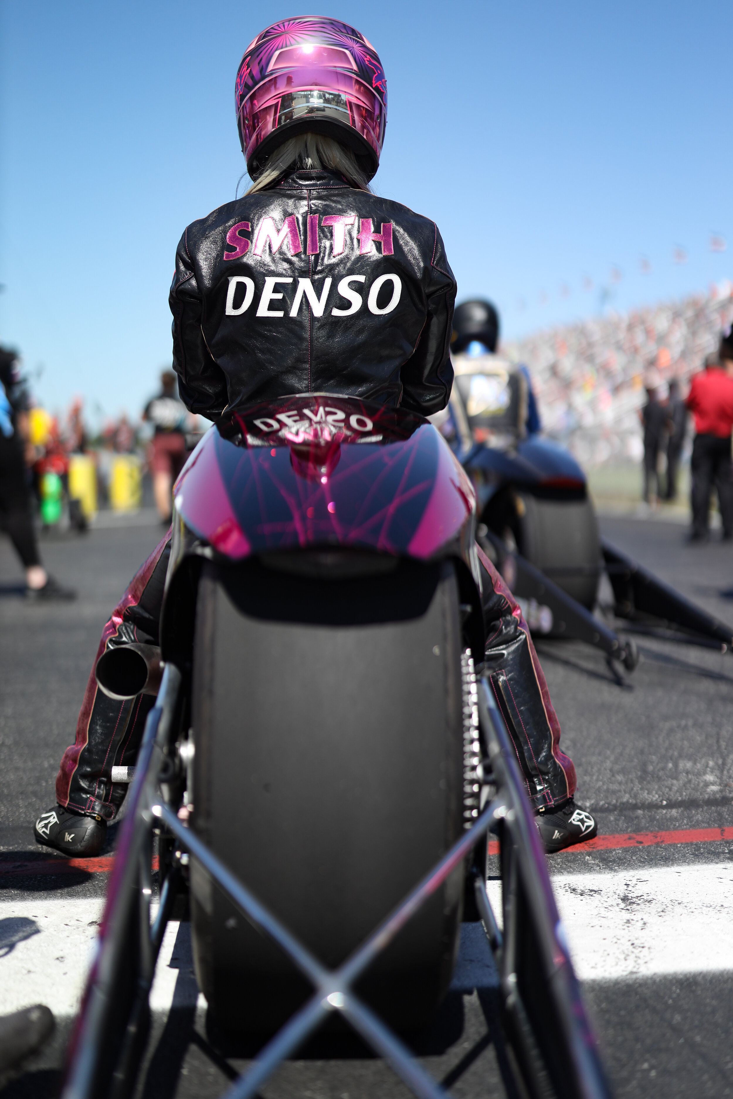 Pro Stock motorcycle racer Angie Smith waits patiently before her run.