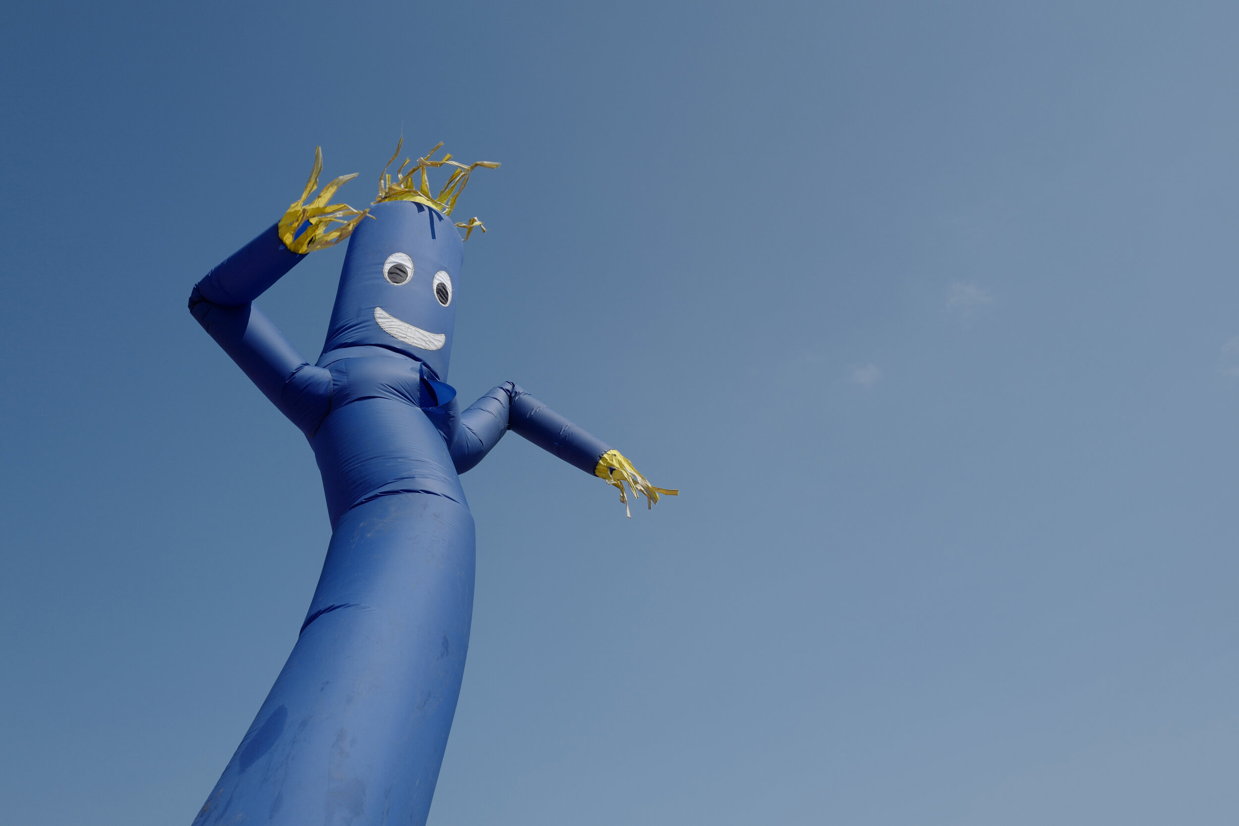  Wacky inflatable flailing arm man. Although joy is designed to be portrayed with this model, seeing this design brings on a melancholy feel to me. - Shot with - Leica Q. 