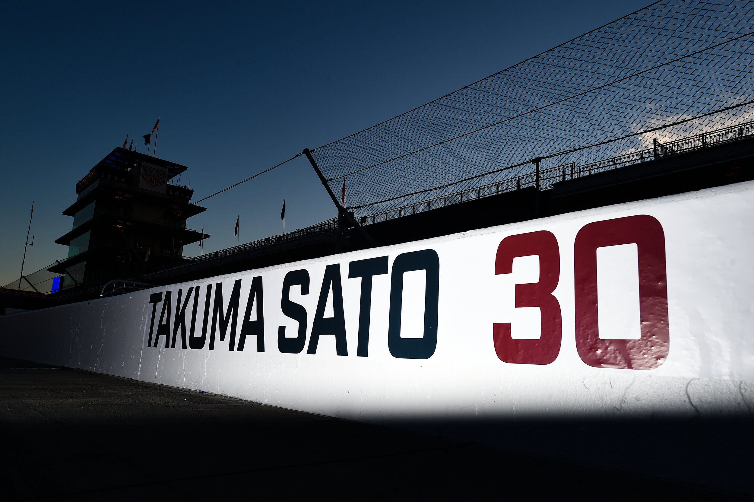   Indianapolis 500 Winning pit box of Takuma Sato. I love how still the image is knowing the amount of action that takes places in these pit boxes. 