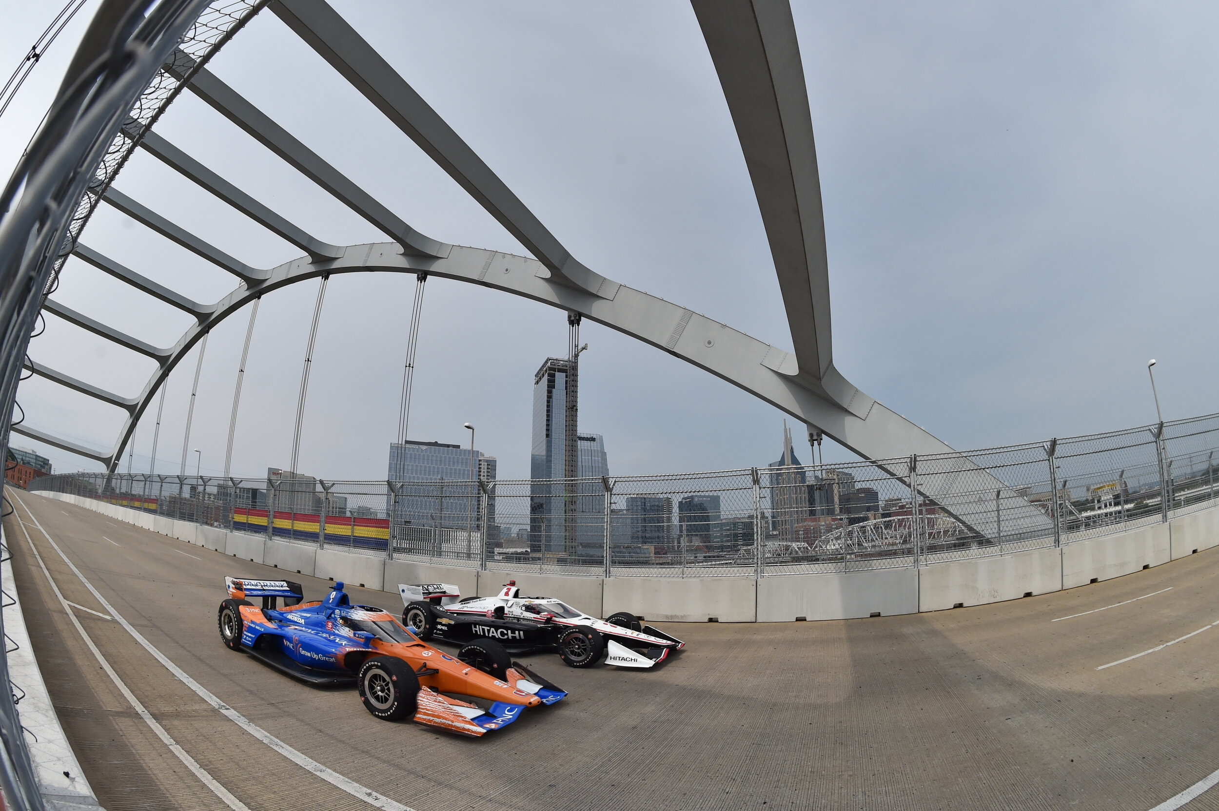 Scott Dixon &amp; Josef Newgarden drag race over the Korean Veterans Memorial Bridge.