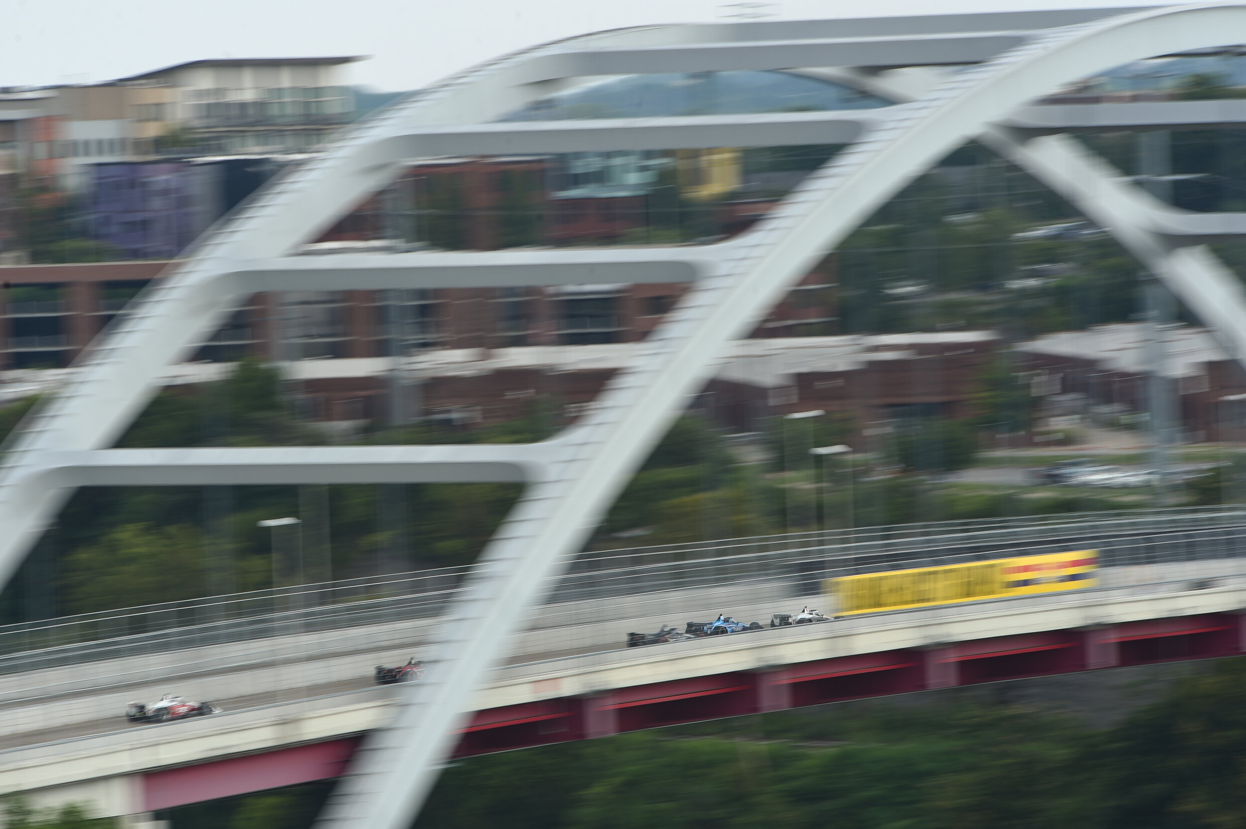 Indycars race over the Korean Veterans Memorial Bridge.