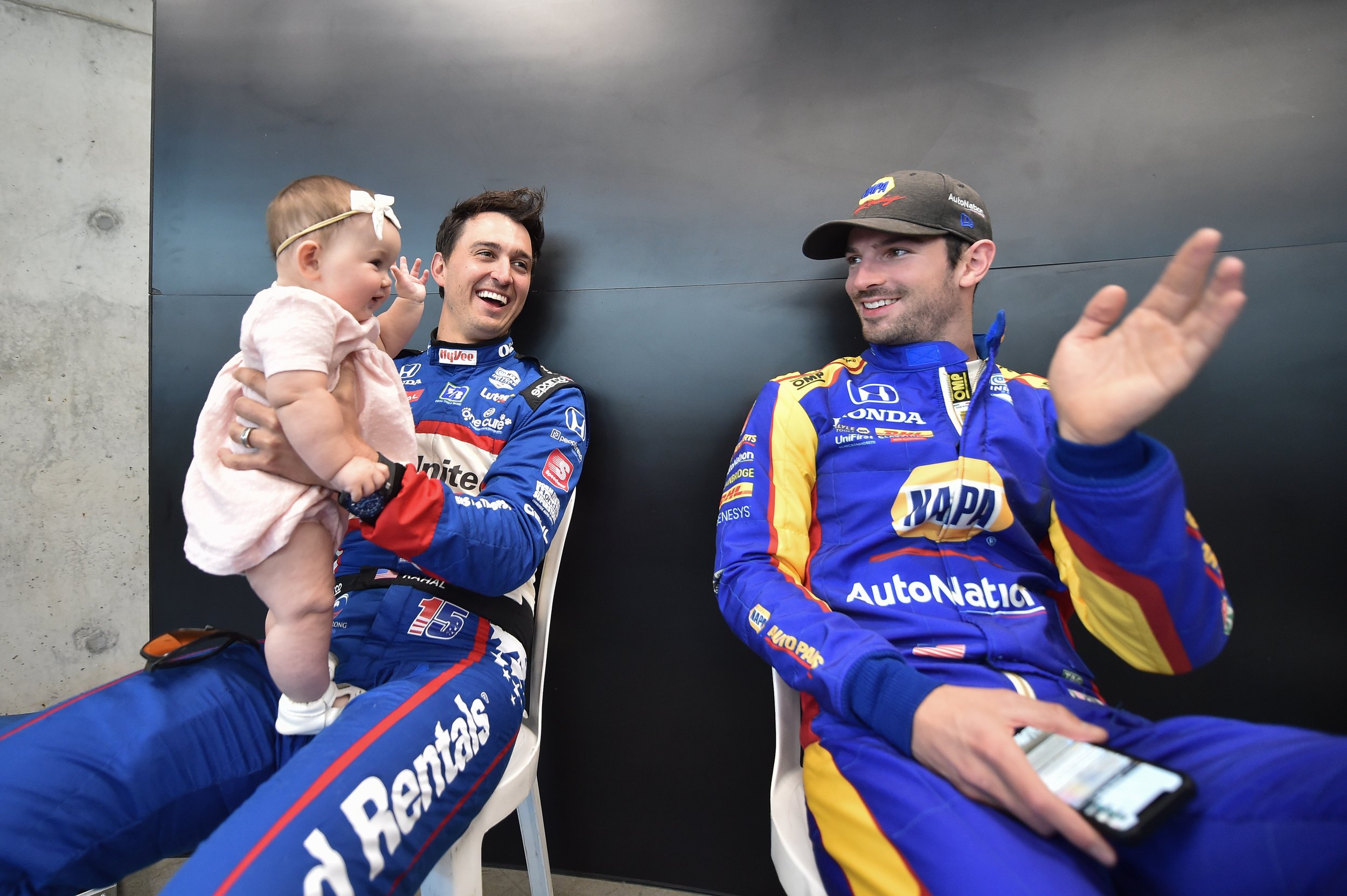 Graham and Harlan Rahal share a moment with Alexander Rossi - Indianapolis Motor Speedway.