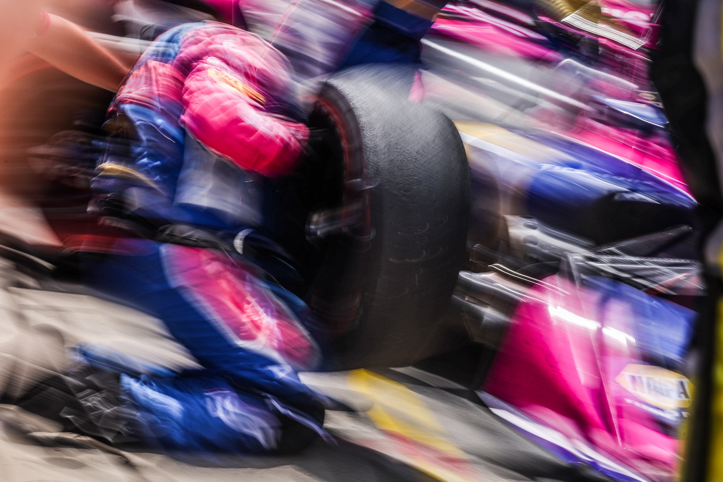 Art in motion, an IndyCar pitstop - Indianapolis Motor Speedway.