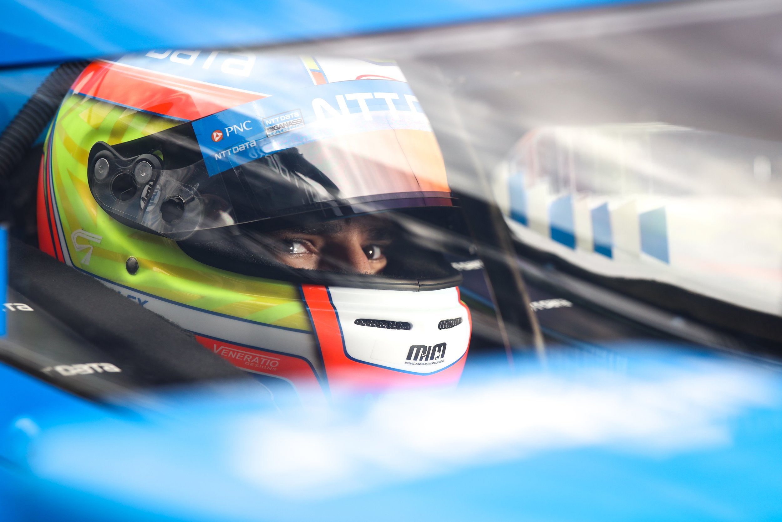 Alex Palou awaits team adjustments during Indy 500 Practice at Indianapolis Motor Speedway. 