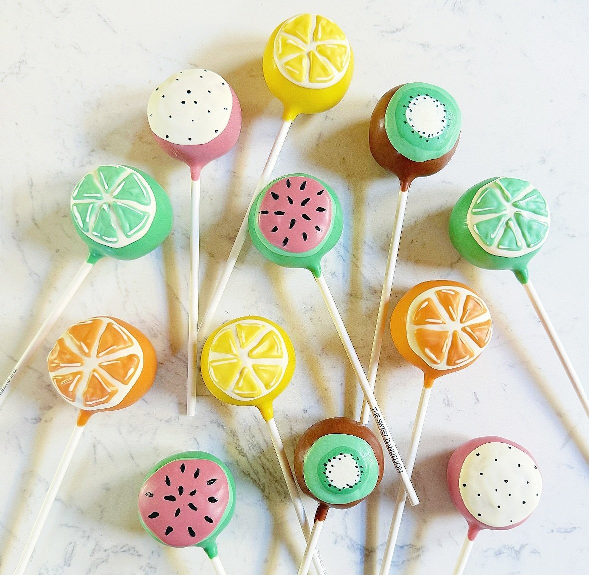 Fresh fruit for the summer! 🍉🍊🍋🥝🍋&zwj;🟩
&bull;
&bull;
&bull;
#cakepops #baking #dessert #sweets #foodie #foodporn #foodphotography #instadessert #foodofinstagram #bakersofinstagram #dessertgram #cakepopsofinstagram #cakepopstagram #cakepopart #