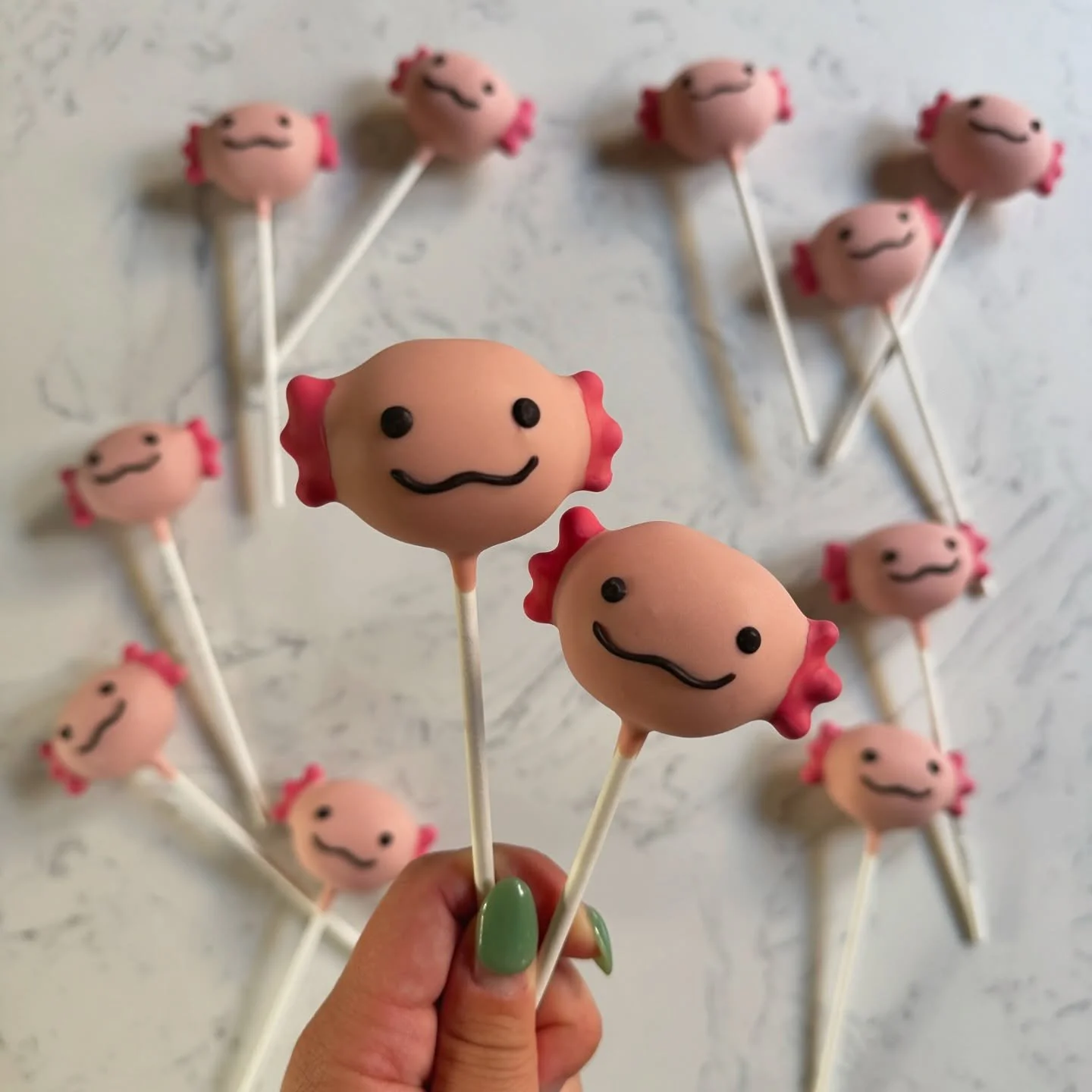 Made a little bunch of axolotls ✨
&bull;
&bull;
&bull;
#cakepops #baking #dessert #sweets #foodie #foodporn #foodphotography #instadessert #foodofinstagram #bakersofinstagram #dessertgram #cakepopsofinstagram #cakepopstagram #cakepopart #foodstyling 