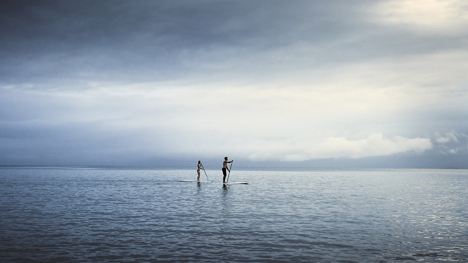 IVDM Photography_adventure_commercial photography_paddle boarders on calm blue sea.jpg