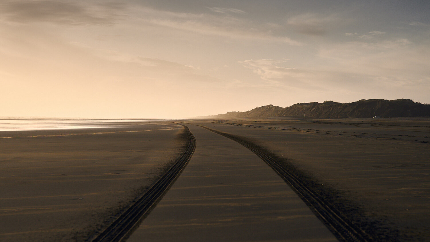 IVDM Photography_Tyre tracks on west coast beack at sunset.jpg