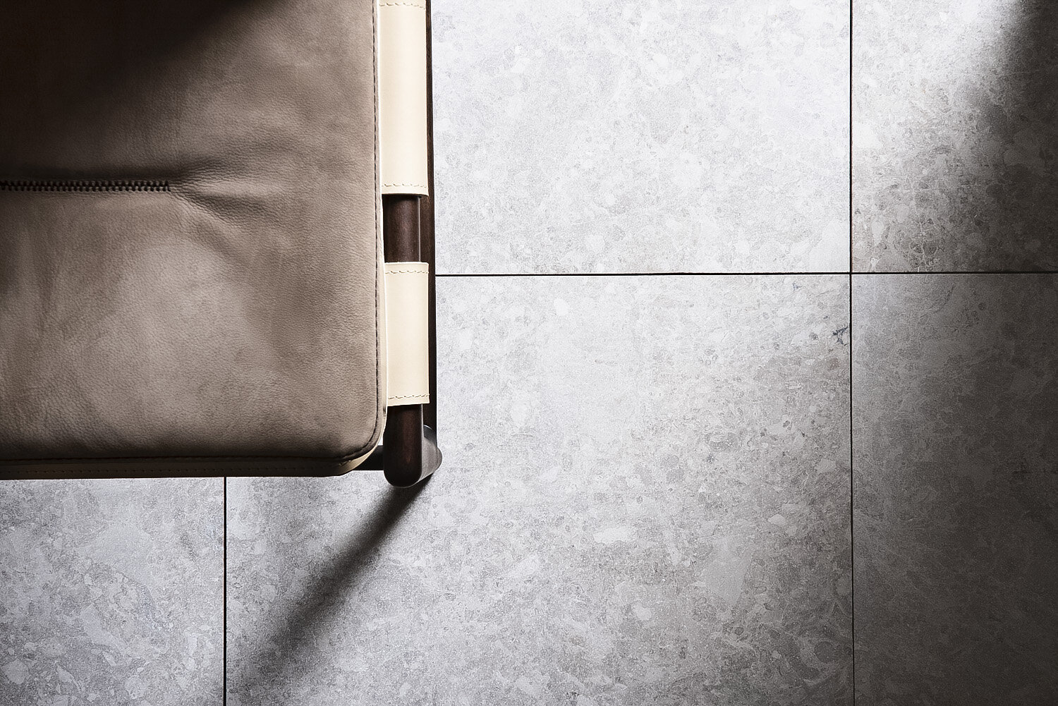 IVDM Photography_European Ceramics luxury chair and stone with moody shadow.jpg