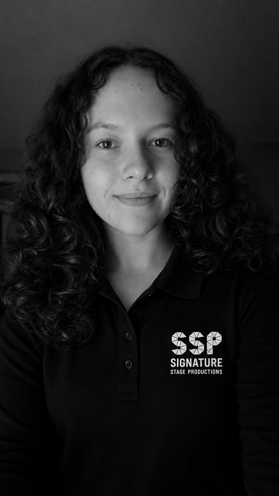 Brena headshot black SSP polo