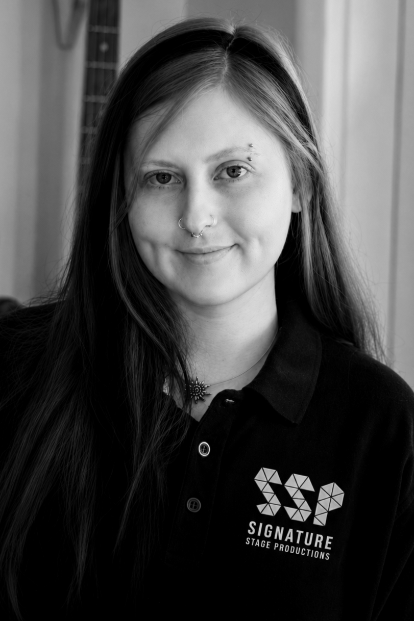 Hannah Heier Black SSP Shirt headshot smiling