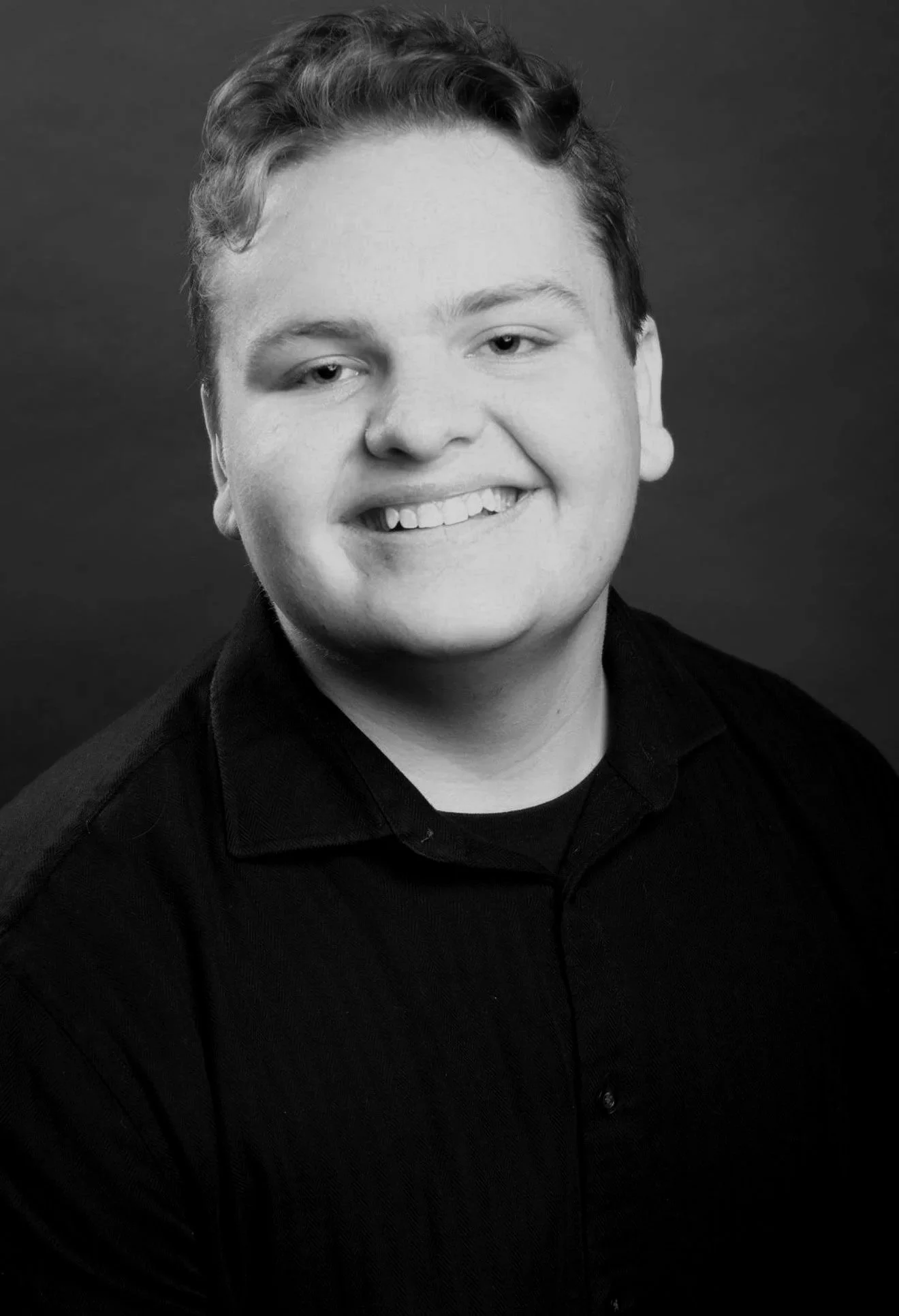 Parker Smiling headshot