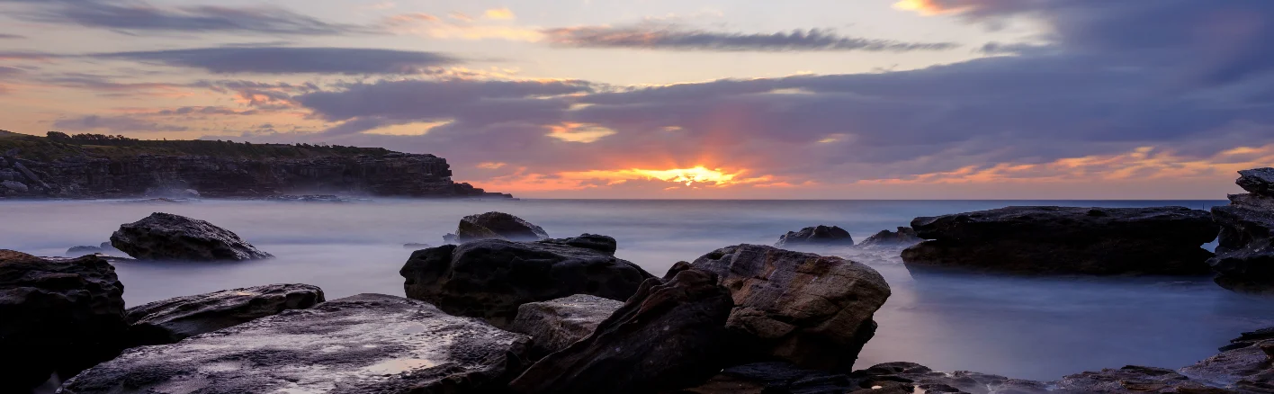 Photo Credit Gratitude to Ding Chen a Little Bay who has depicted the sunrise sky after a full moon at Little Bay. 