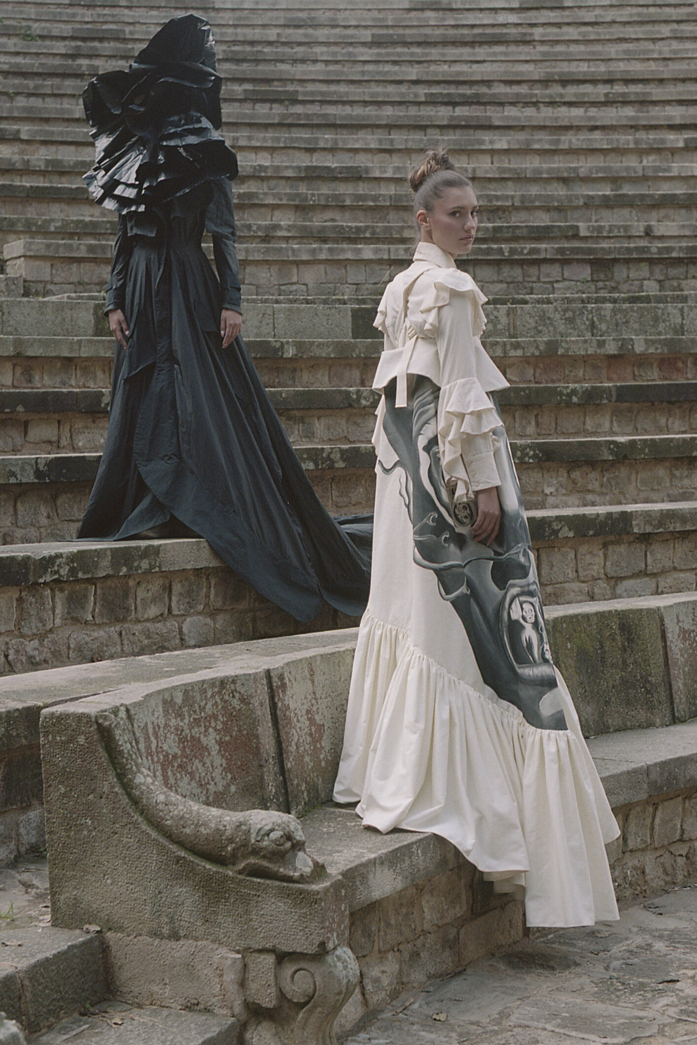  Headpiece, Daniel Davilla. White Dress, Lucía Cano Soto. Black Dress, Najjat Harb 