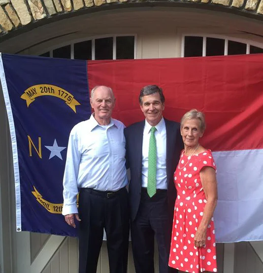Bruce and Carol Peterson with Gov Cooper.jpg