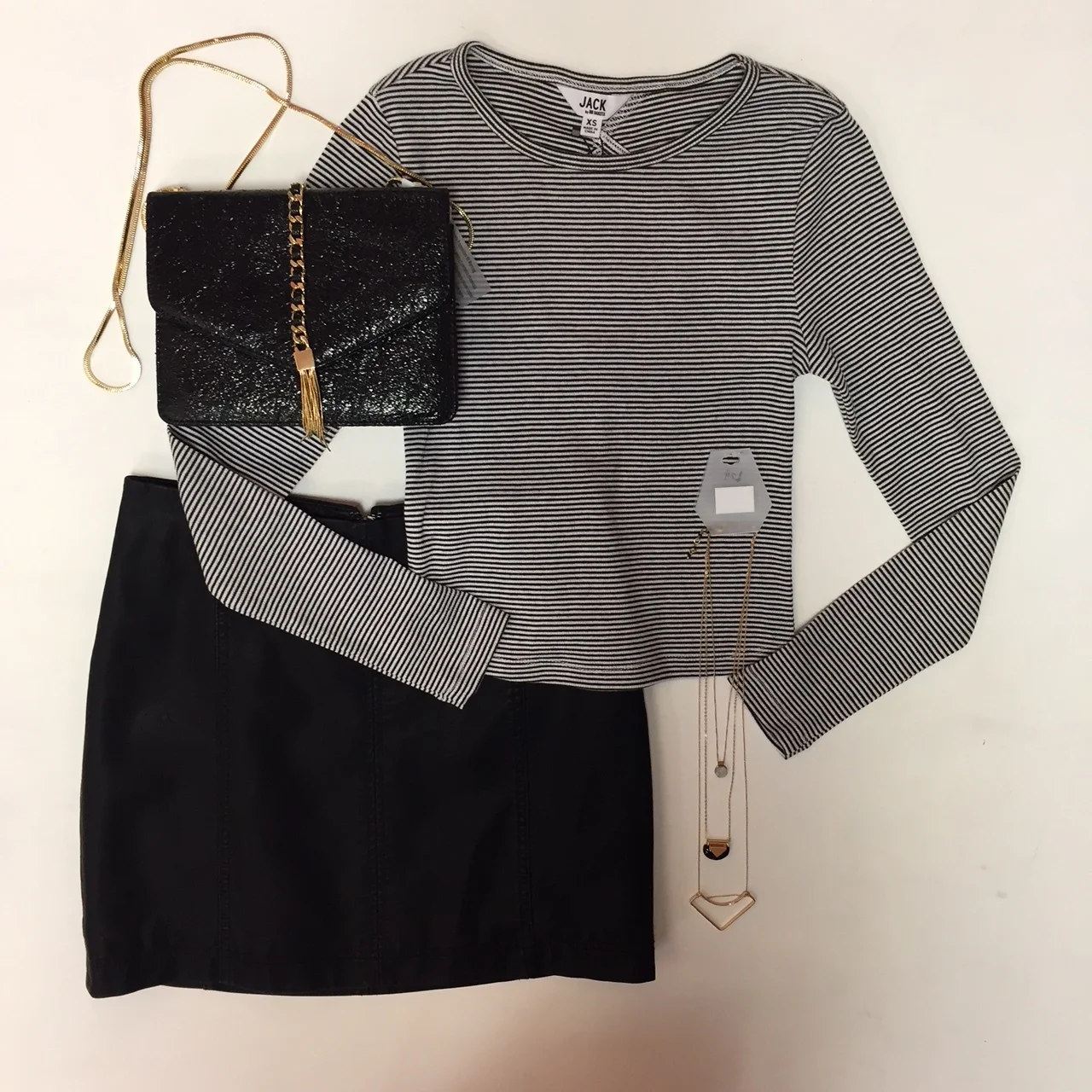 Free People Skirt $60, Jack Crop Top $48, Necklace Set $24, Purse $46