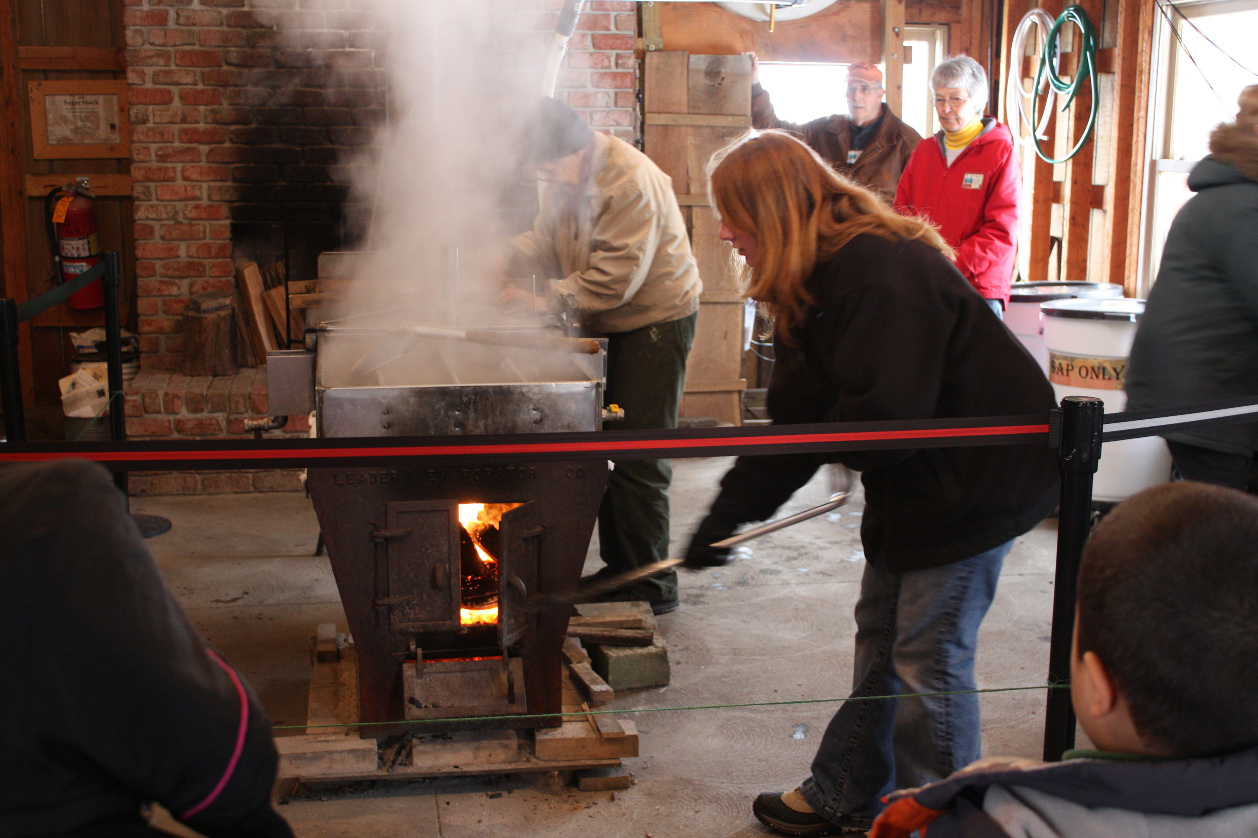 Making maple syrup inside the Sugar Shack