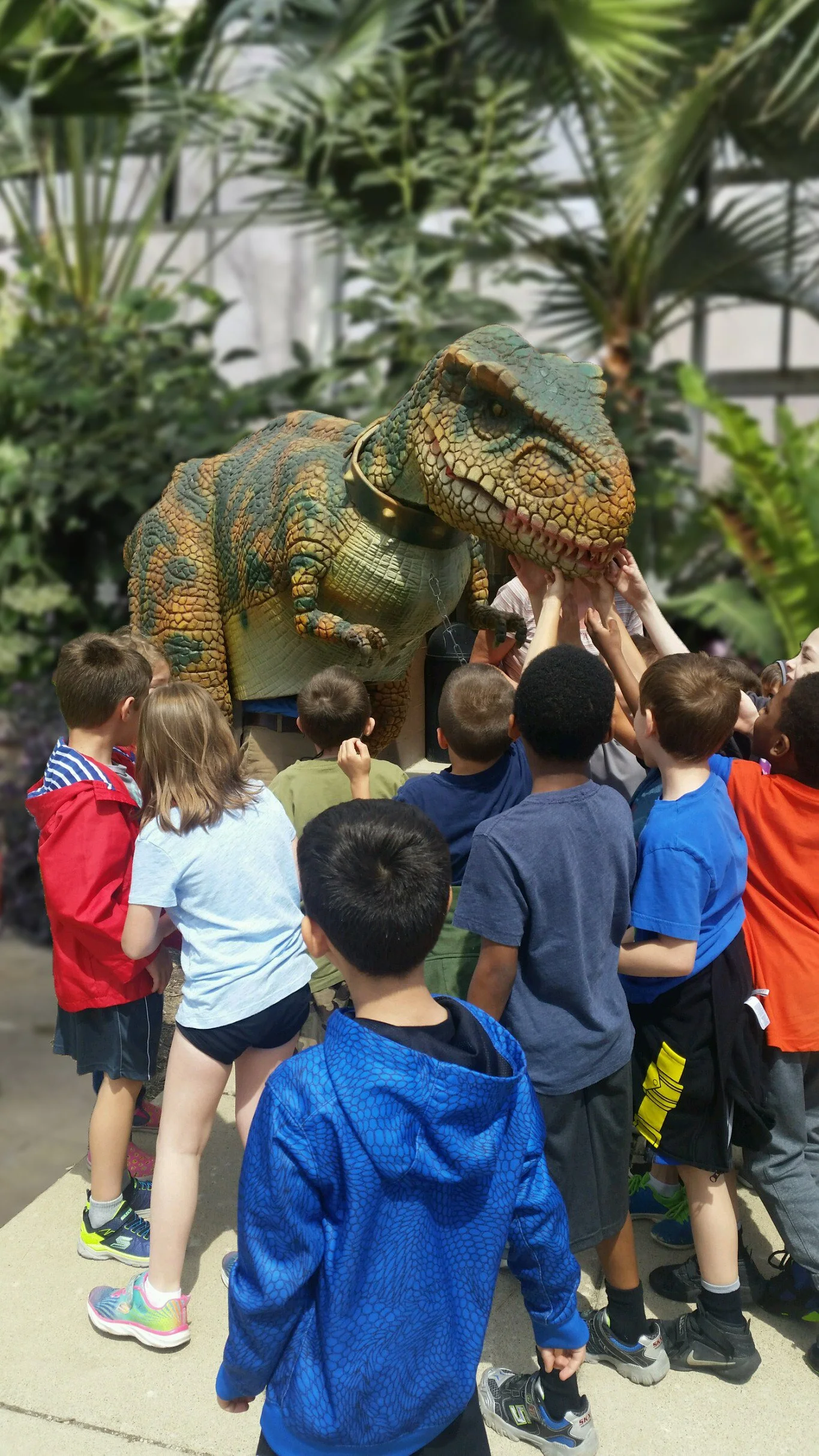 Children with dinosaur display