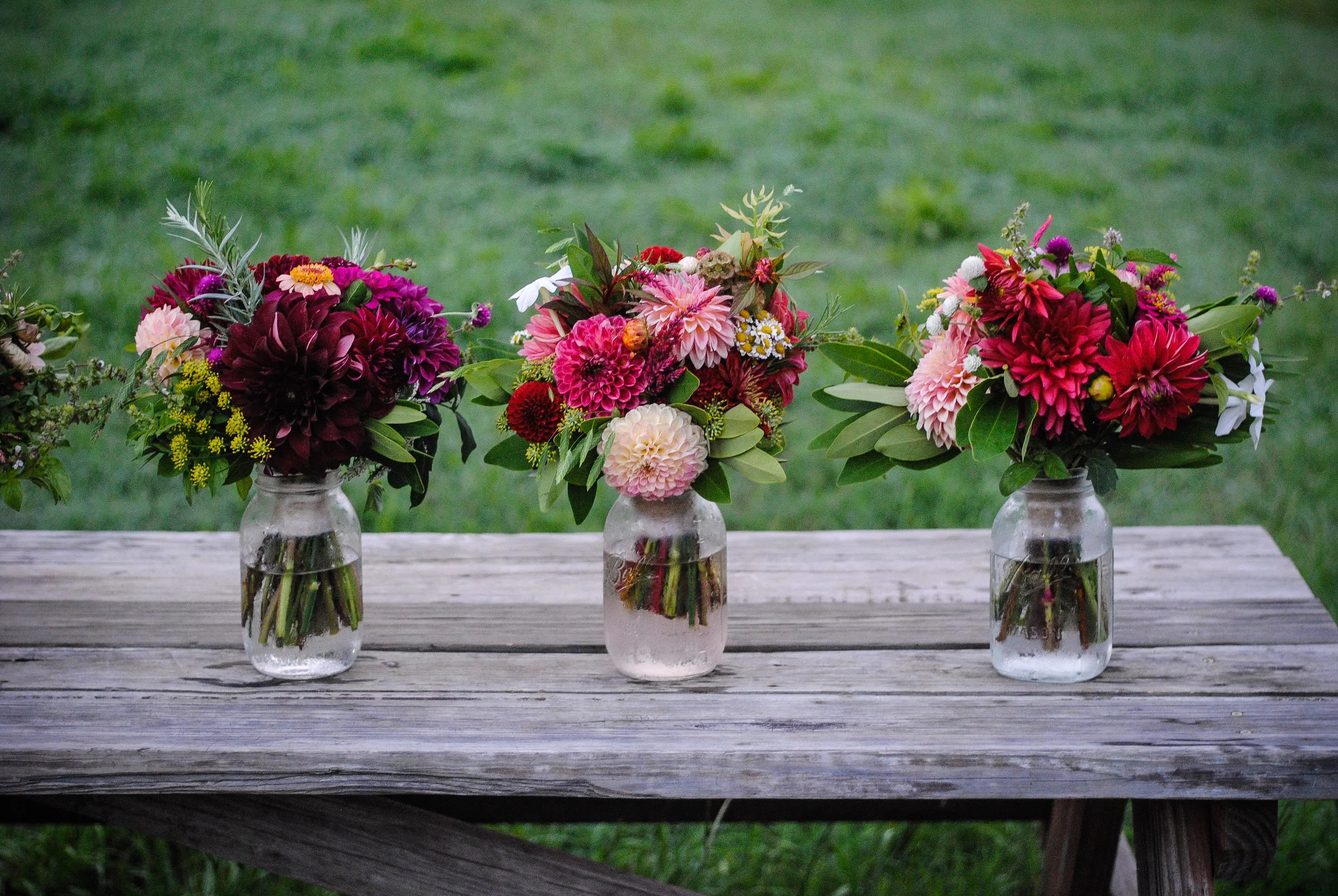 arranging bridesmaid bouquets with mostly dahlias
