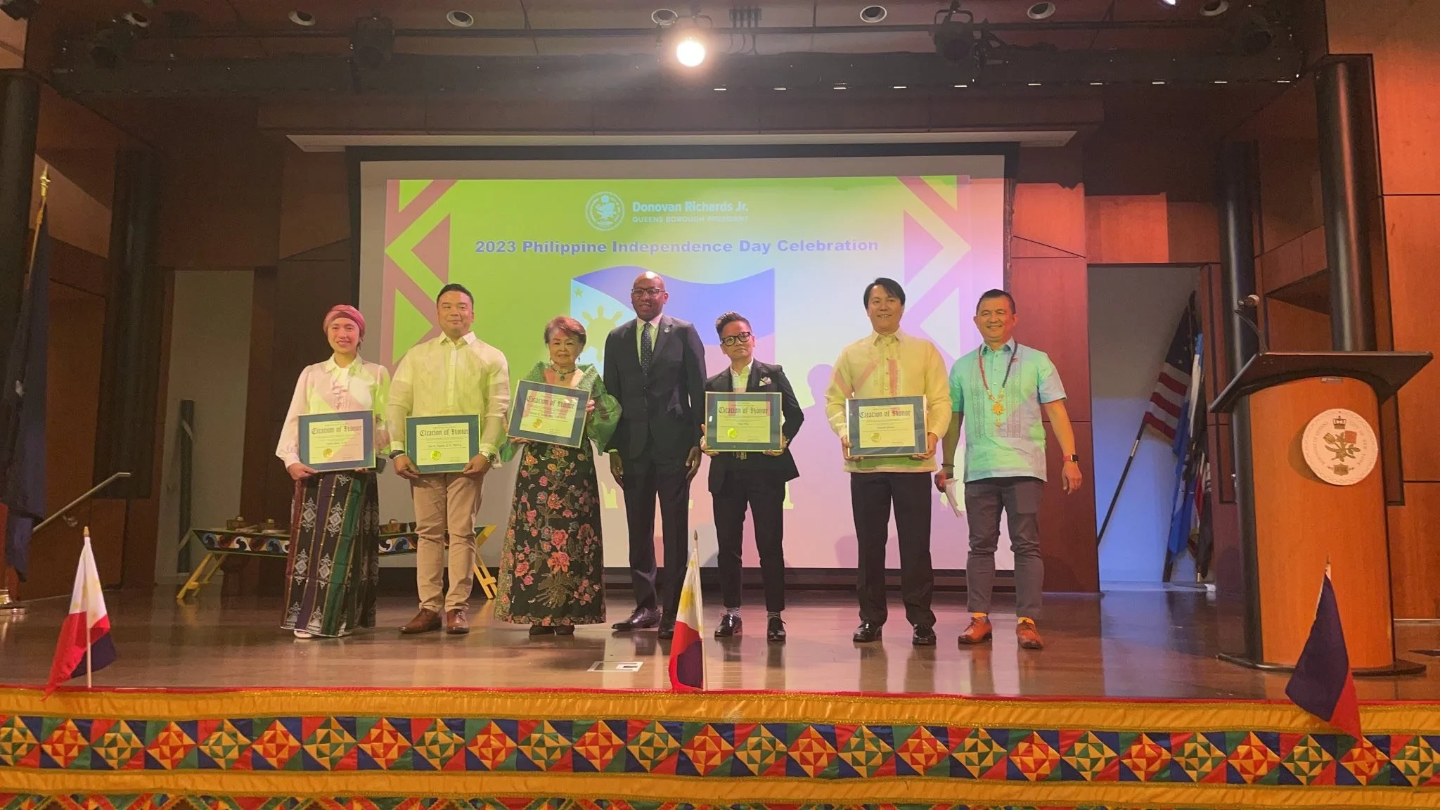 Damayan Executive Director Riya Ortiz received an award from Queens Borough President