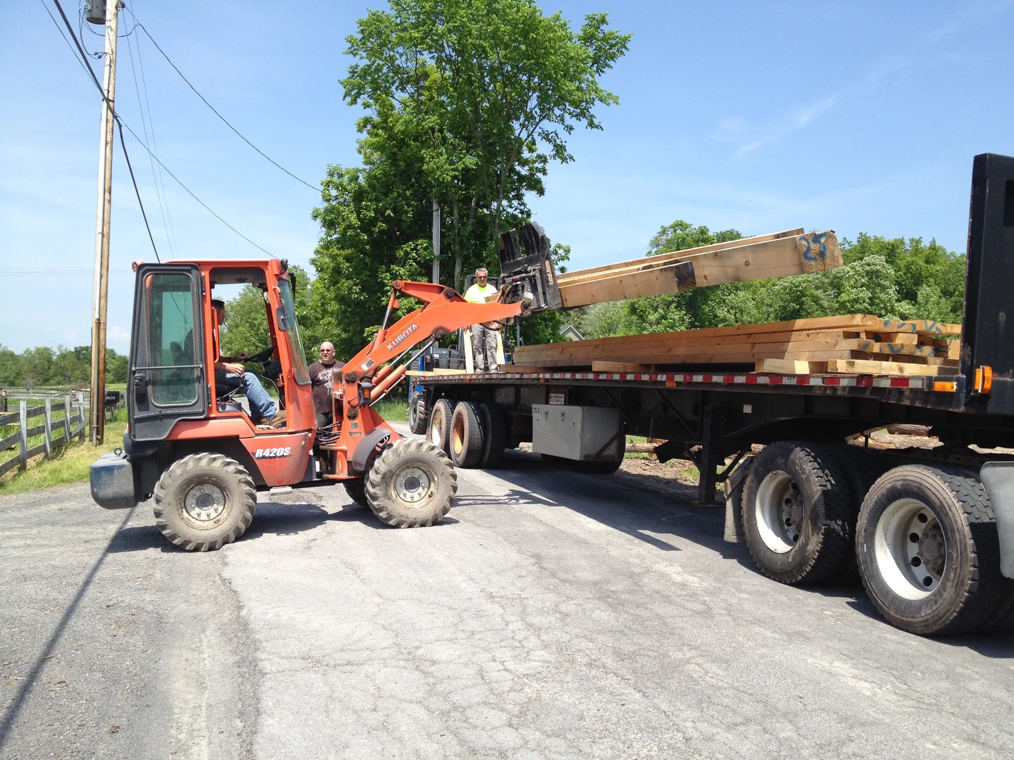  Loading replacement beams at sawmill. 