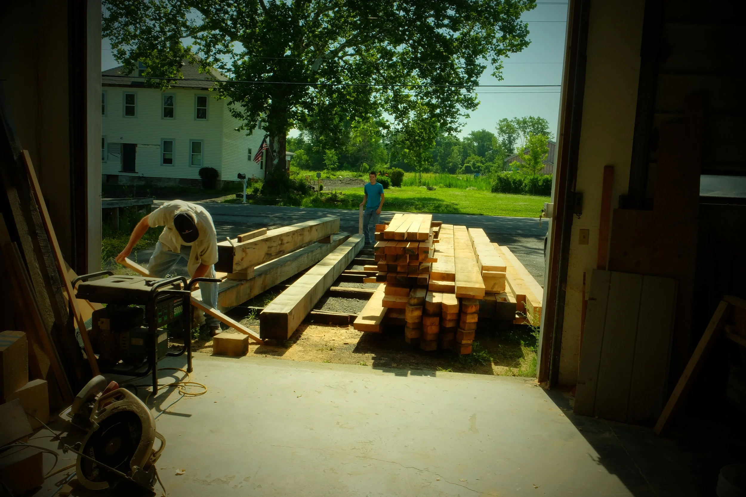 Moving a beam into the shop.
