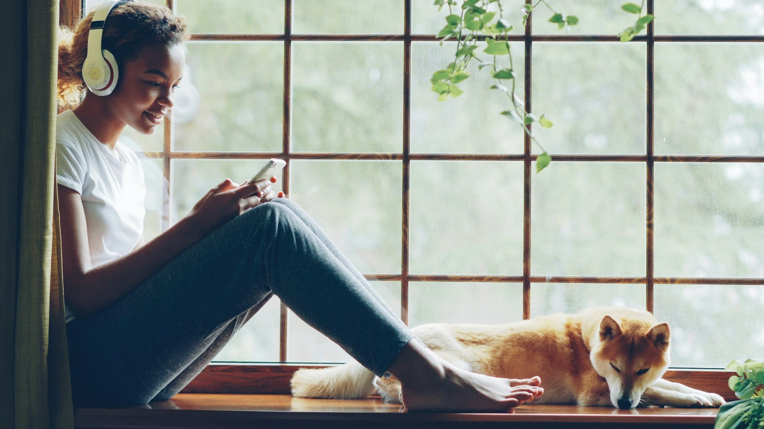 Person resting with headphones during a Safe and Sound Protocol SSP listening session