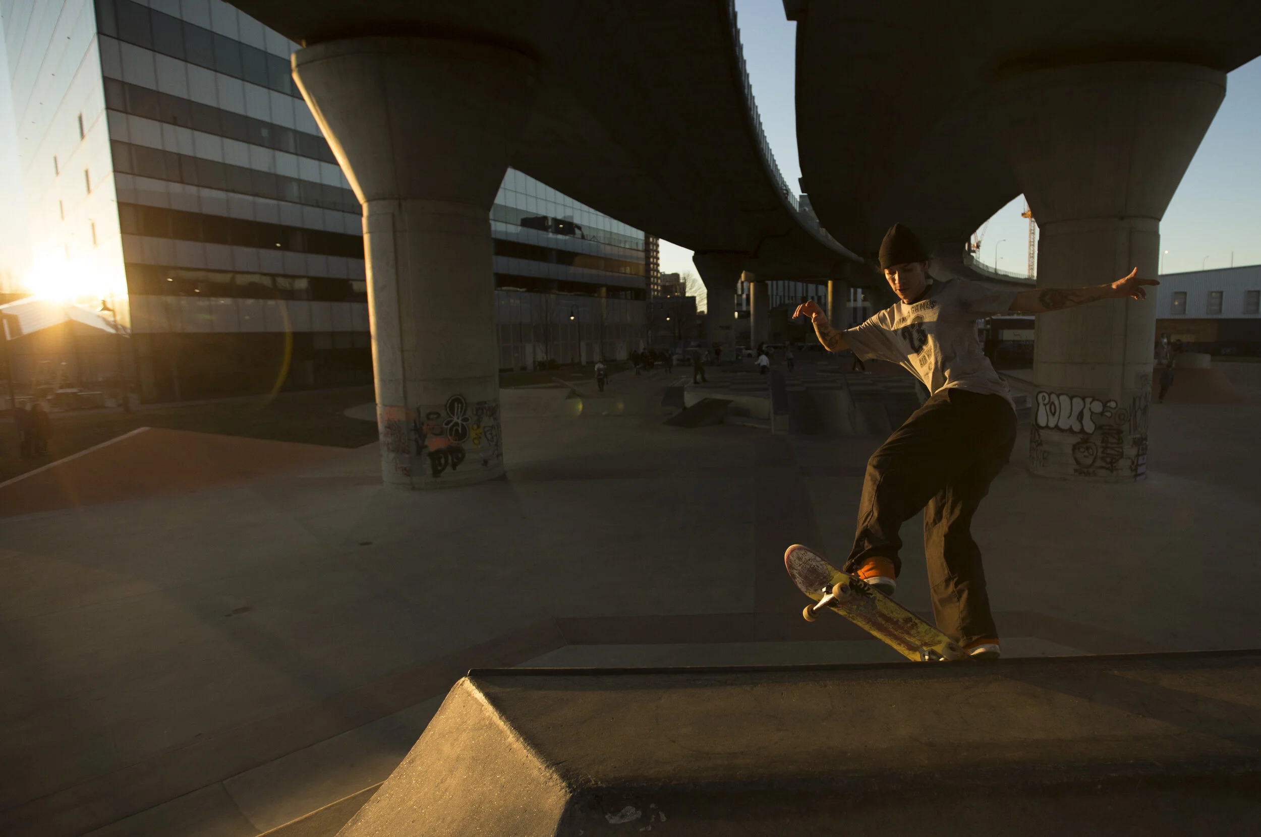 Ramon Candido catches the top of a ramp at the Lynch Family Skatepark in Boston, MA, on Jan. 12, 2020. The city broke another heat record after a string of unseasonably warm winter days causing residents to take to the outdoors.