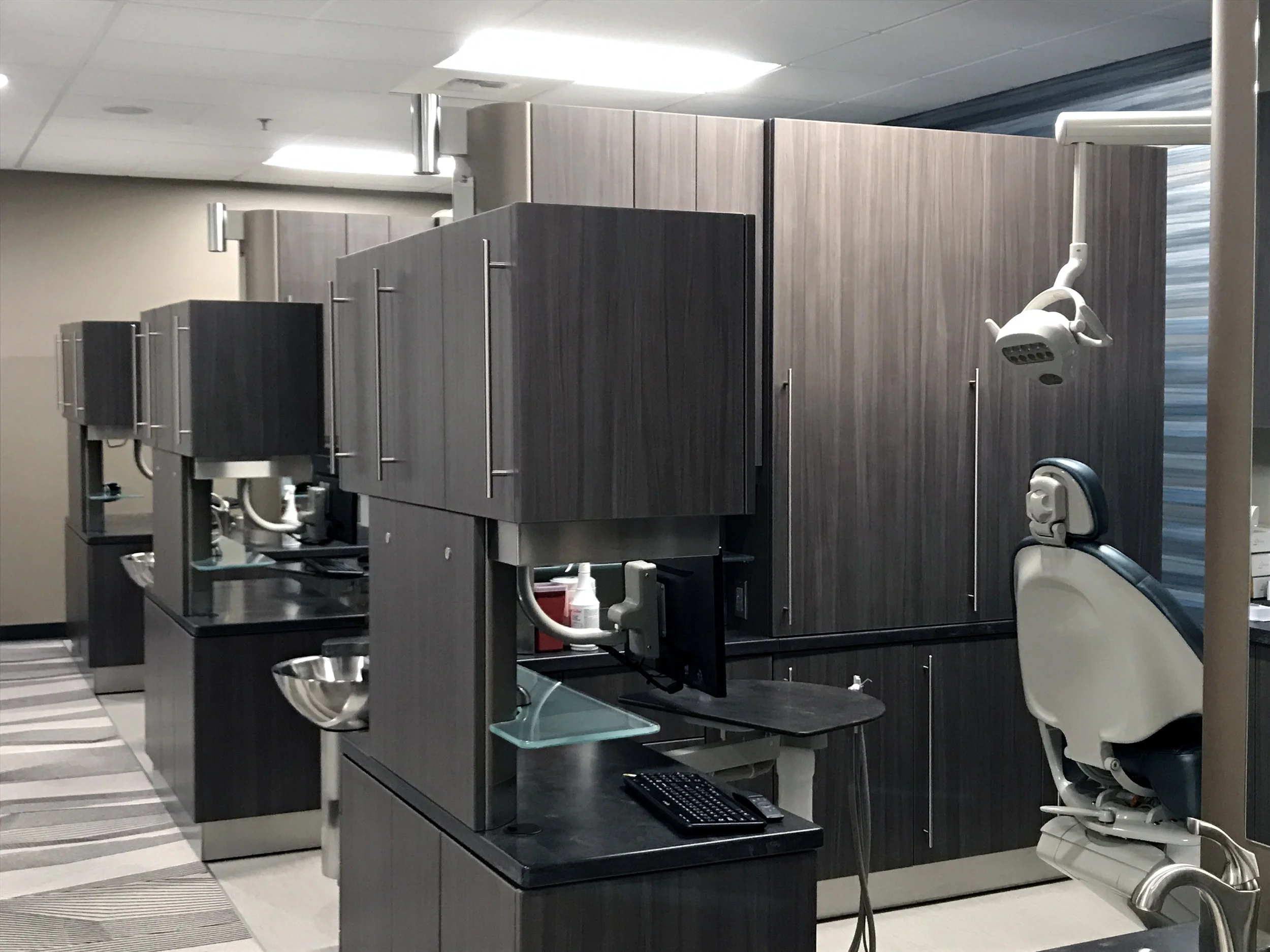 Four-chair treatment area designed for efficient dental care at Revive Smiles Dentistry in Seattle