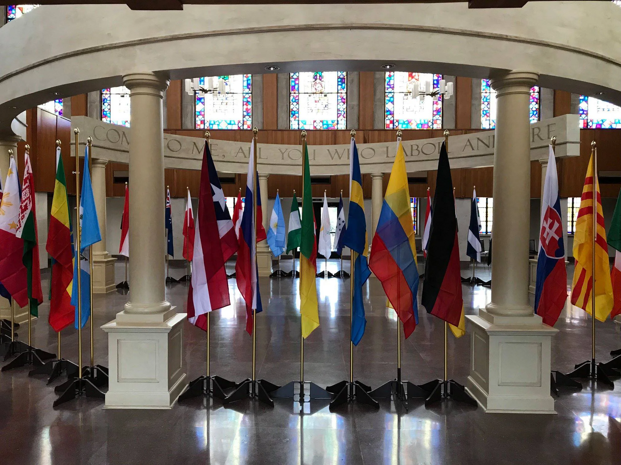 Flags from more than 40 countries encircled the narthex,then were proudly carried into the church by representatives of that country!