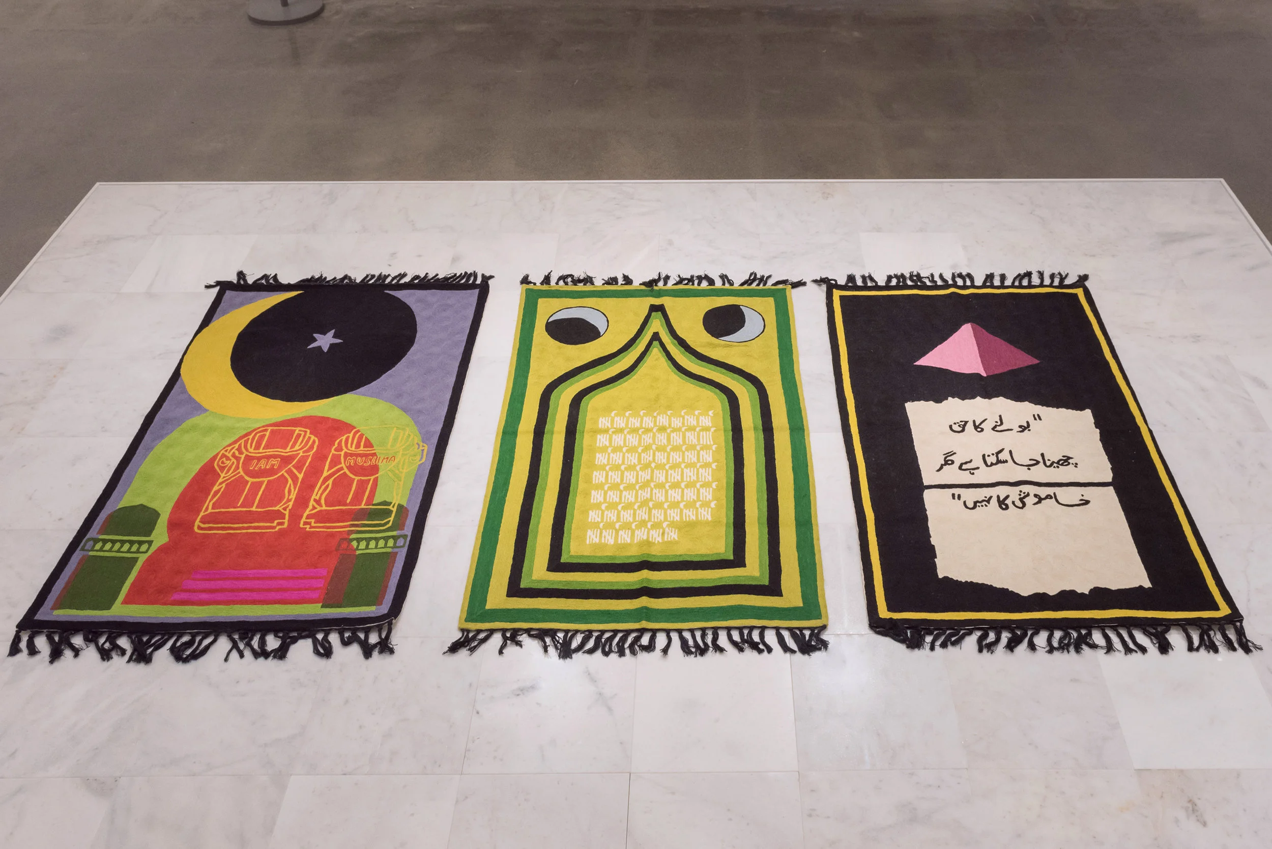 (From left to right) Purple Heart, Lunar Count Down, Act Up, at Katonah Museum of Art, NY, Handmade wool rugs custom designed by artist, made in Kashmir, 48 × 30 in, installed on marble platform, 2018