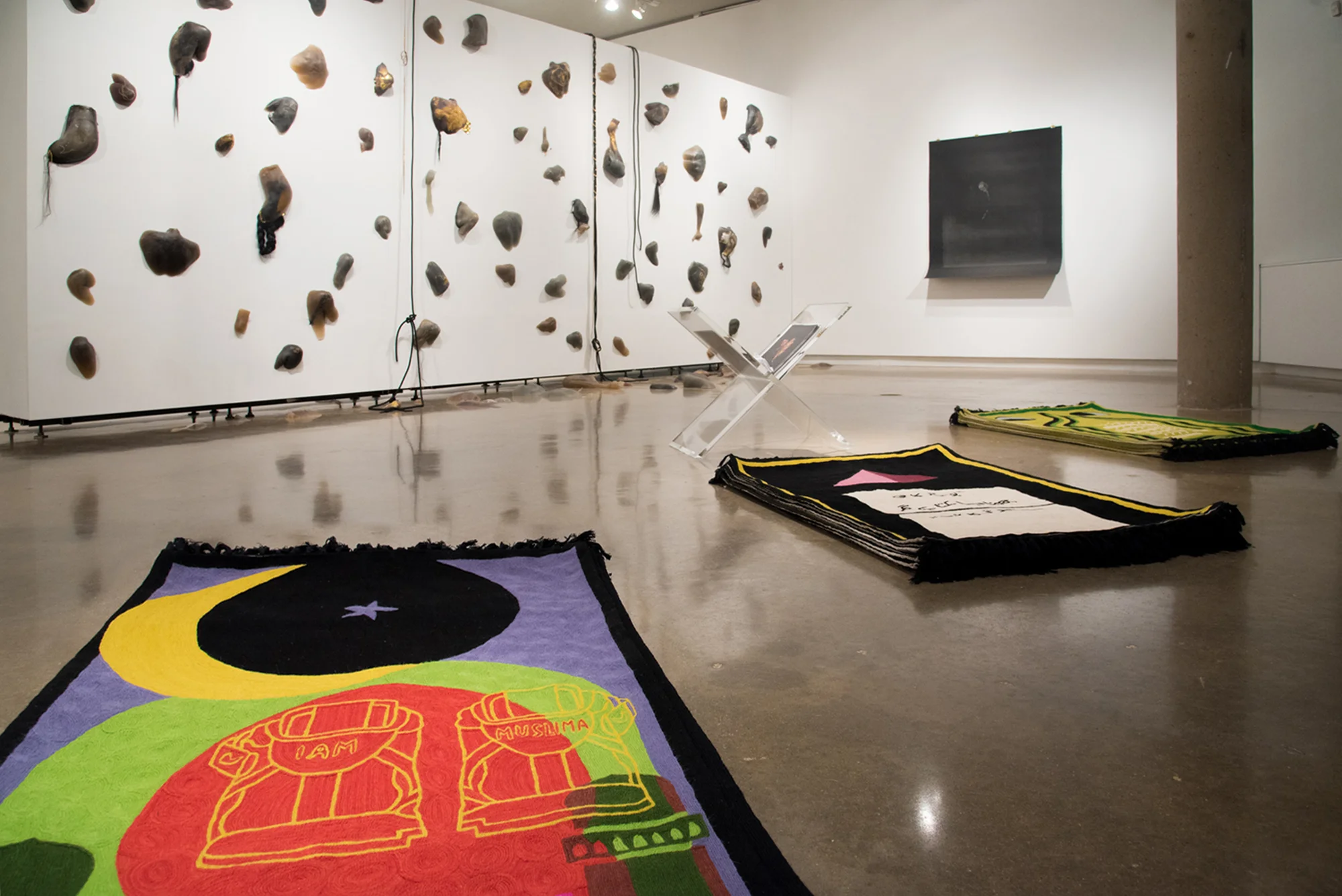 (From left to right) Purple Heart, Act Up, Lunar Count Down, Handmade wool rugs custom designed by artist, made in Kashmir, India, 48 × 30 in, 2017