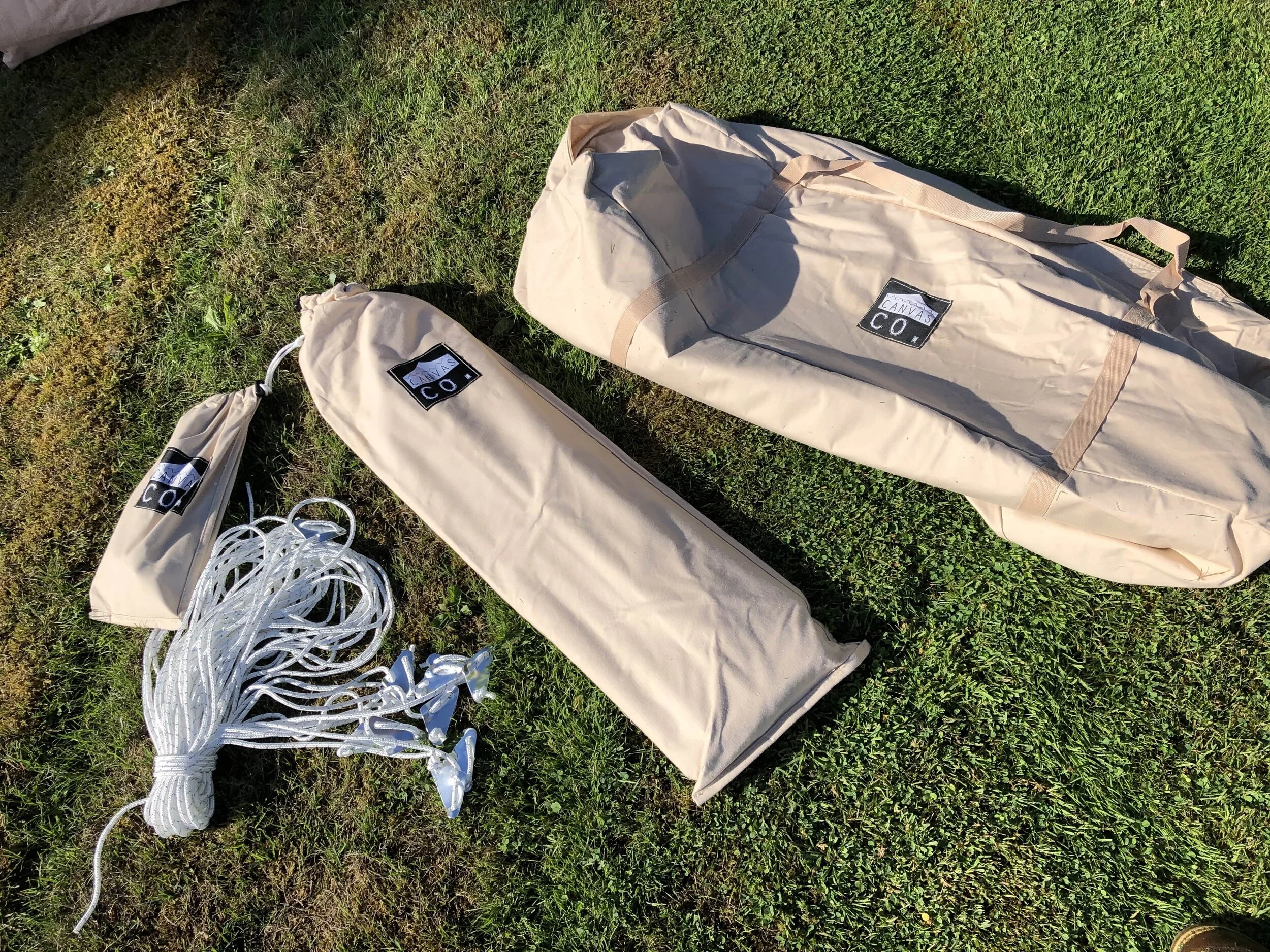 Canvas bags for the bell tent poles and pegs