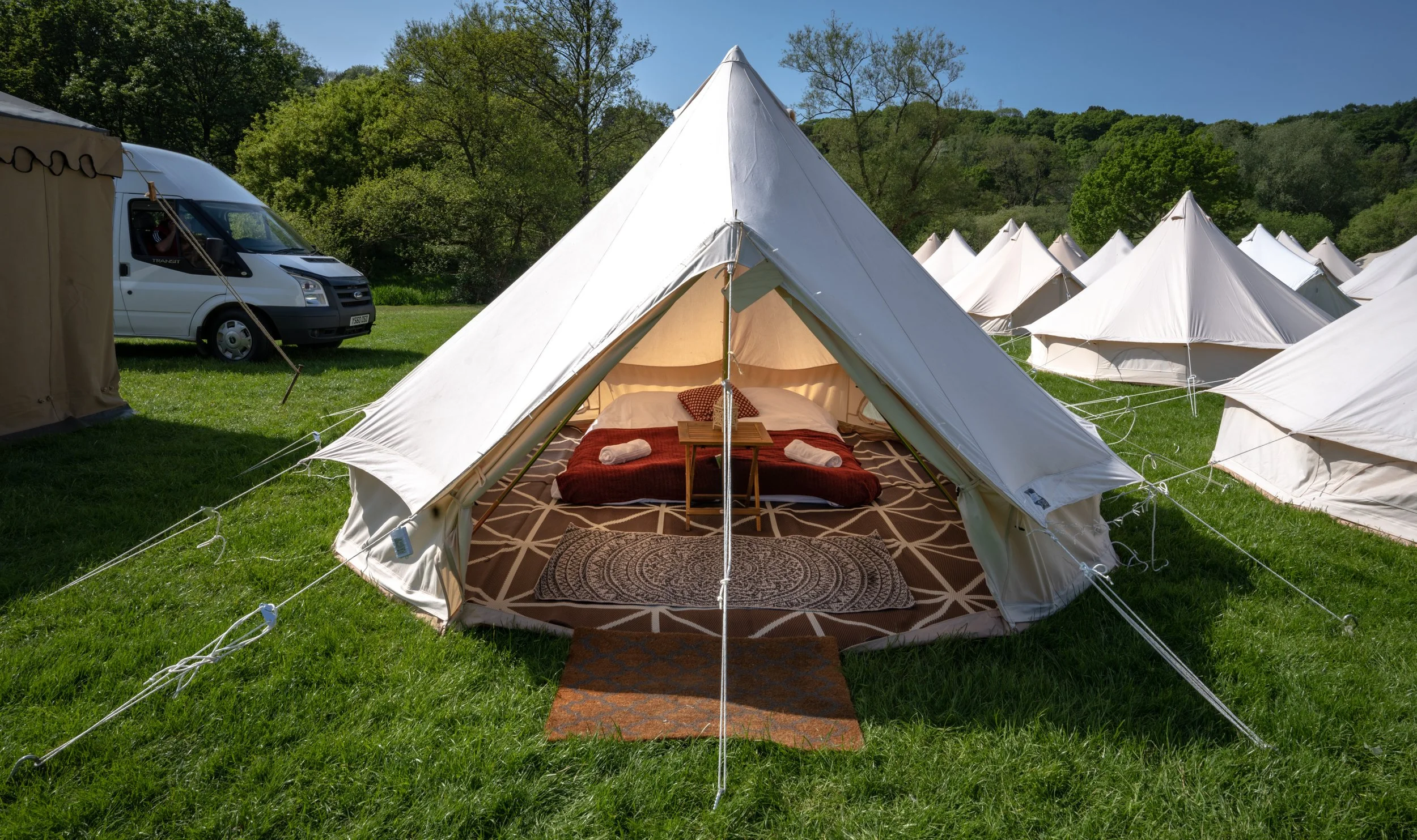 basic bell tent with sheets and airbeds