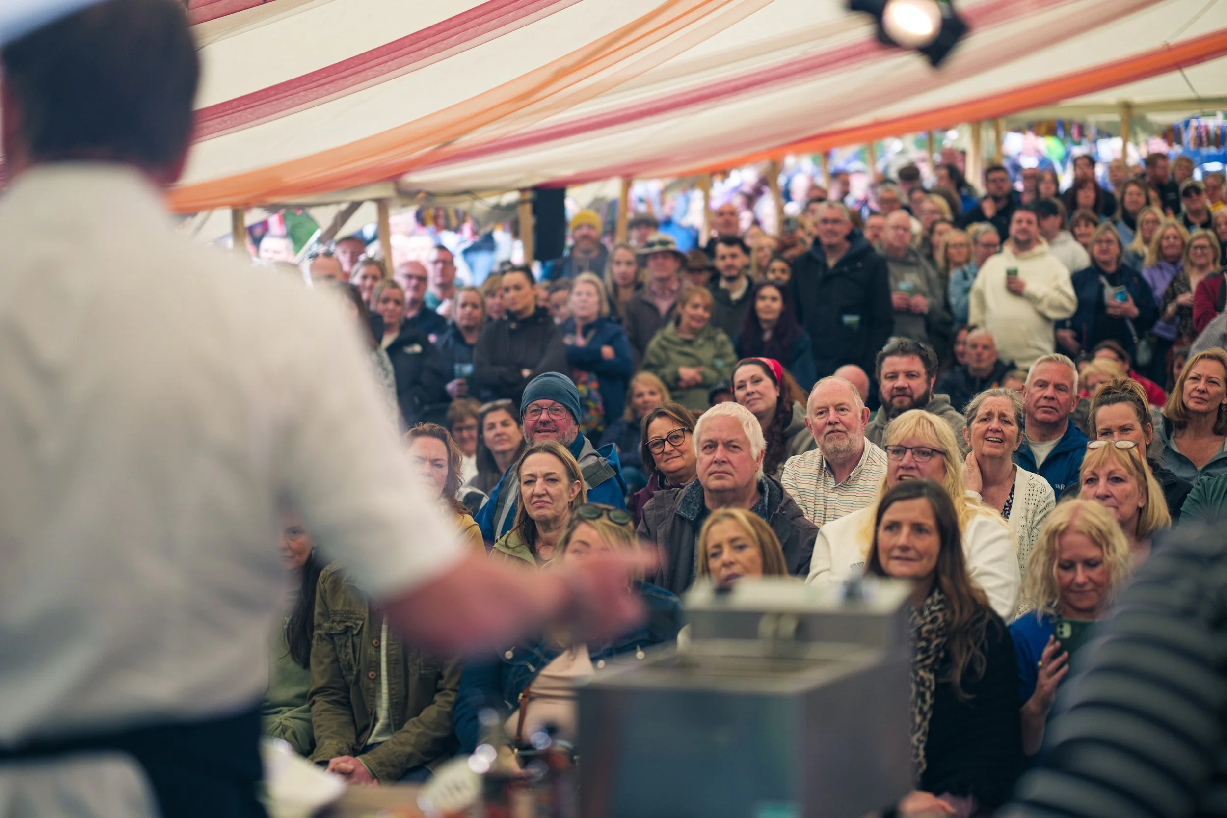 Fields to fork crowd inside a marquee