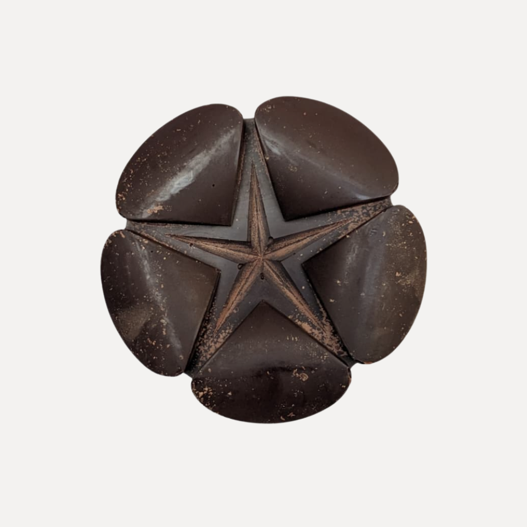 Ceremonial cacao pod arranged in portioned pieces