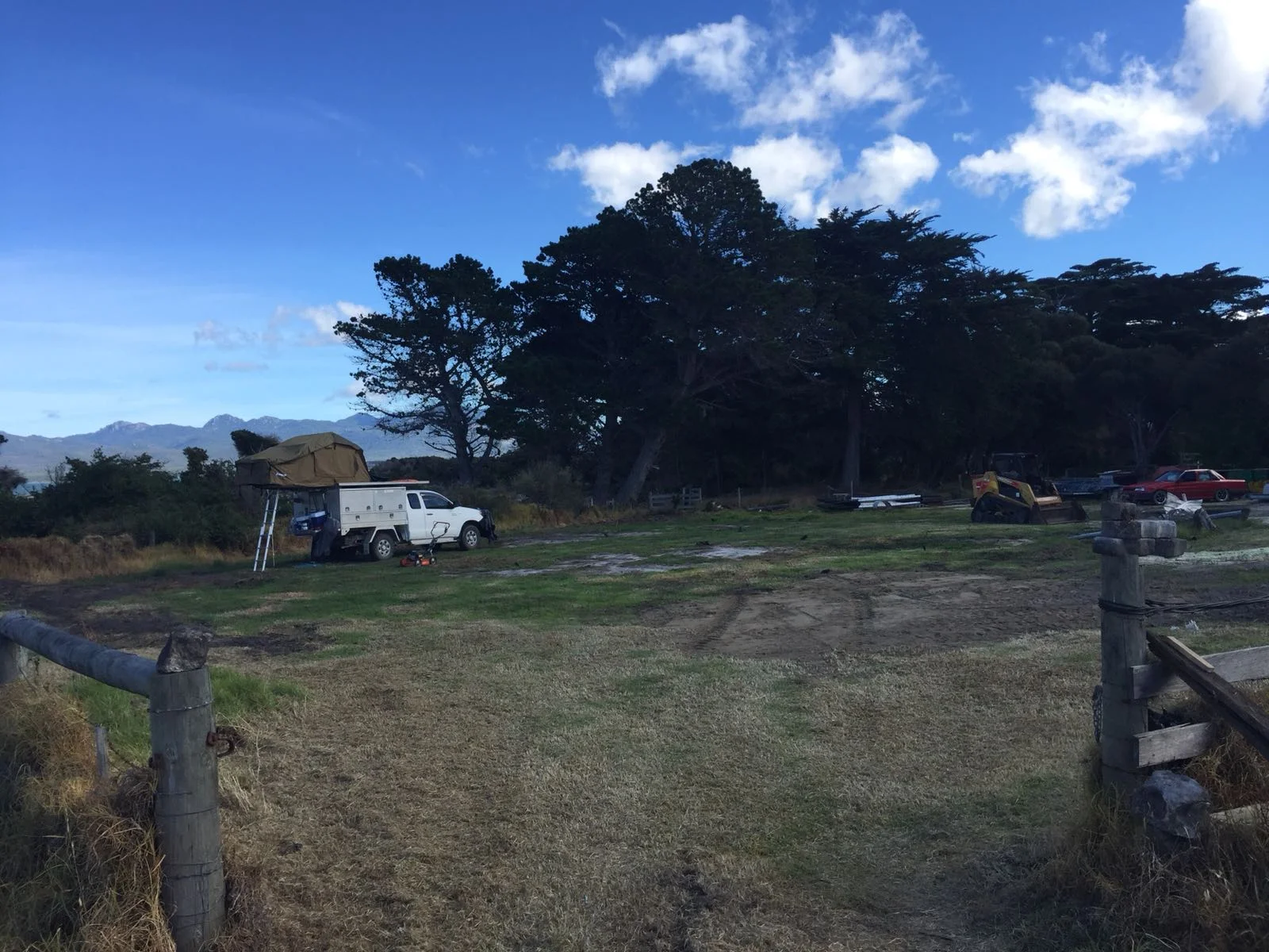 TasPort lease site - essentially a bare block of land but good sea / road access. TasPorts to install power and water. In backgrtound is the Ute. 