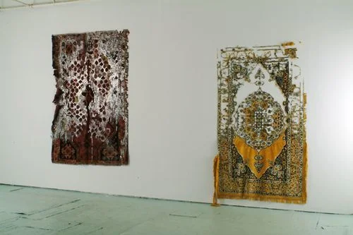 Civilization and its Discontents, 2003 Persian and Persian type carpets, mixed fabrics, metal staples, Dimensions variable Installation view at Smack Mellon, Brooklyn, New York Photo by Hermann Feldhaus