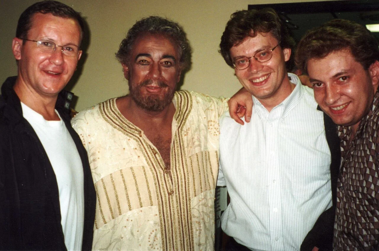 Musicians celebrating with Domingo after a performance of Otello on the Japan tour