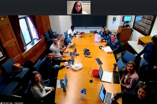 ASAP Co-Founder, Swapna Reddy, communicating via Skype with a team of lawyers